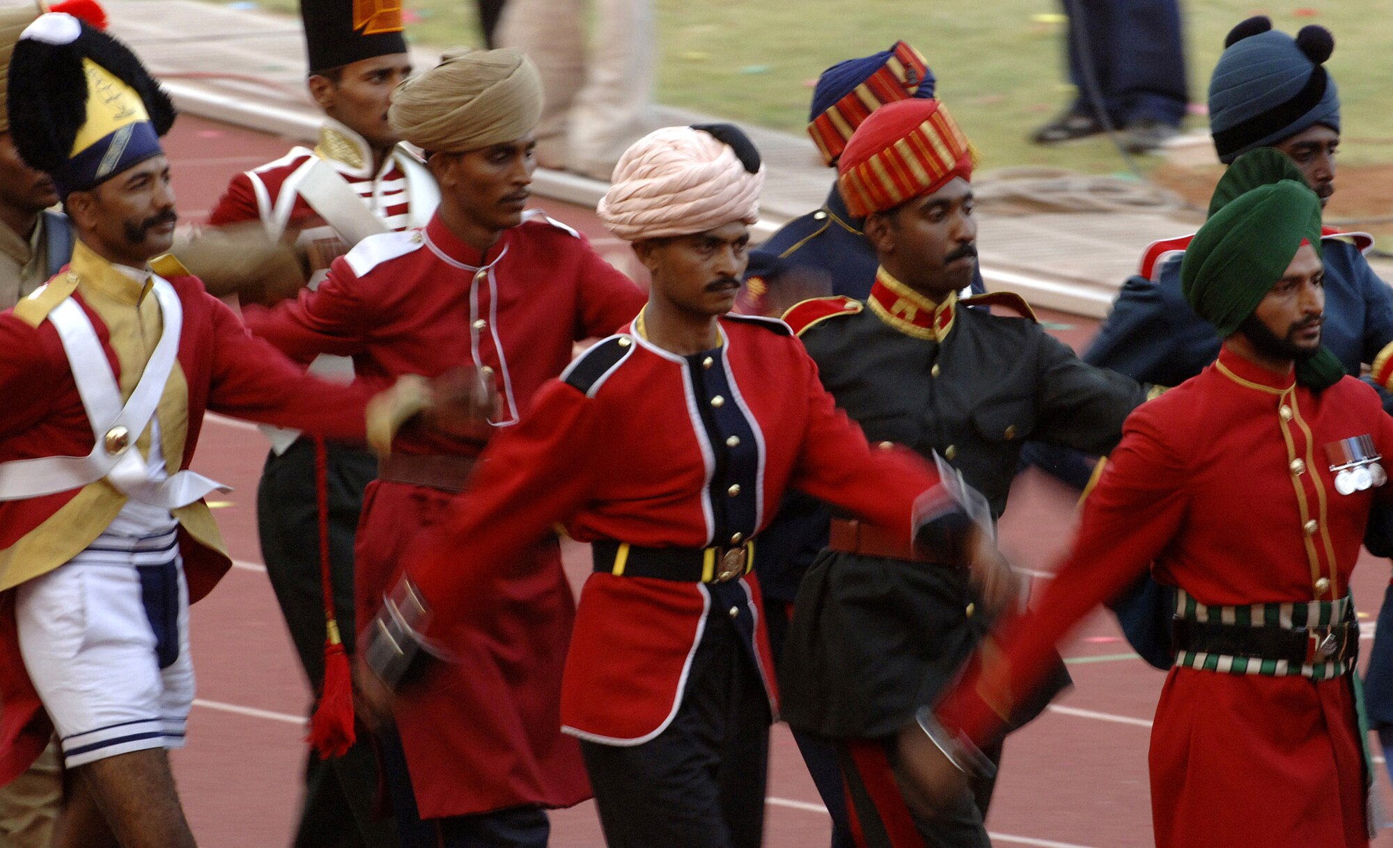 Indian soldiers in historical, traditional and contemporary ceremonial dress lead the athletes participating in the 4th Conseil Internationale du Sport Militaire Military World Games, set  in Hyderabad, India, Oct. 14 to 21.  This is the largest international military Olympic-style event in the world. In this fourth edition of the games, 103 countries and more than 5,000 athletes are competing Oct. 14 to 21 in boxing, diving, soccer, handball, judo, military pentathlon, parachuting, sailing, shooting, swimming, volleyball and track and field. The purpose of the Military World Games is to promote "friendship through sport."  (U.S. Air Force photo/Master Sgt. Glenda S. Lynchard) 