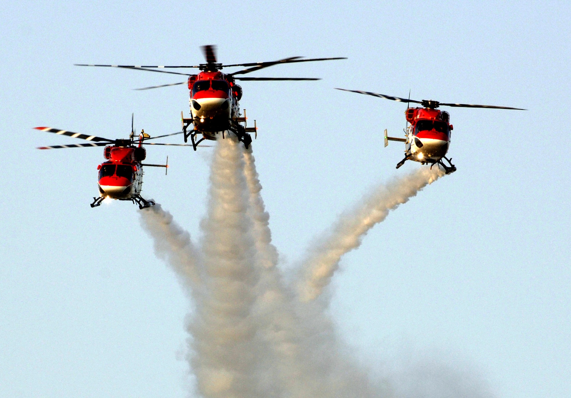 Indian air force helicopters perform for more than 6,000 people at the Gachibowli Stadium in Hyderabad, India, for the 4th Conseil Internationale du Sport Militaire Military World Games Oct. 16.  This is the largest international military Olympic-style event in the world. In this fourth edition of the games, 103 countries and more than 5,000 athletes are competing Oct. 14 to 21 in boxing, diving, soccer, handball, judo, military pentathlon, parachuting, sailing, shooting, swimming, volleyball and track and field. The purpose of the Military World Games is to promote "friendship through sport."  (U.S. Air Force photo/Master Sgt. Glenda S. Lynchard)