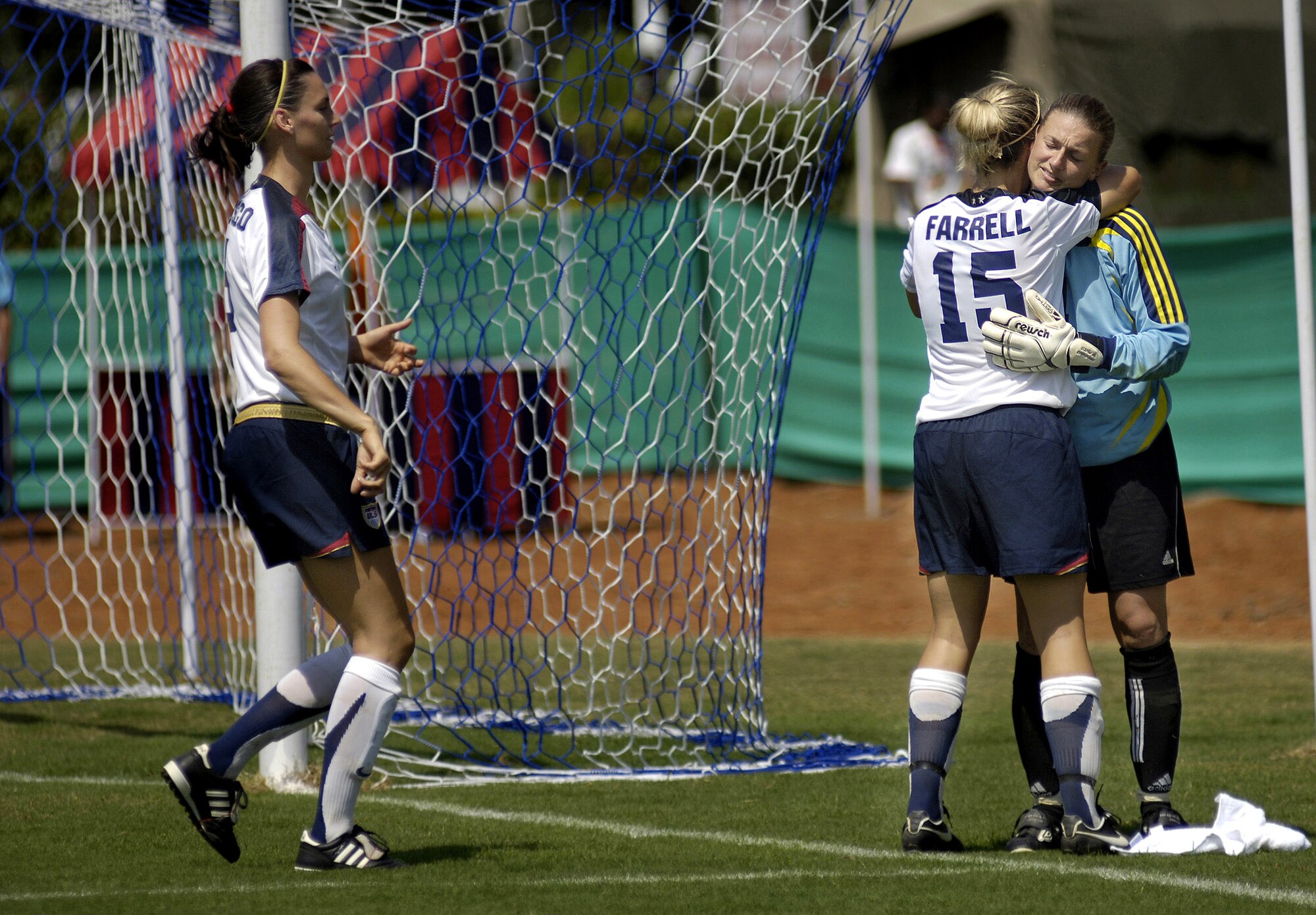 U.S. Army Capt. Randee Farrell gives goal keeper Capt. Stacie Bortz a hug congratulating her on a great game against the Democratic Peoples Republic of Korea team during the Military World Games' women's soccer competition in Hyderabad, India, Oct. 14. DPR Korea defeated the U.S. team 4-0. The Conseil Internationale du Sport Militaire's Military World Games event is the largest international military Olympic-style event in the world. In this year's fourth edition of the games, 103 countries and more than 5,000 athletes are competing Oct. 14 to 21 in boxing, diving, soccer, handball, judo, military pentathlon, parachuting, sailing, shooting, swimming, volleyball and track and field. The purpose of the Military World Games is to promote "friendship through sport."  (U.S. Air Force photo/Tech. Sgt. Cecilio Ricardo Jr.)