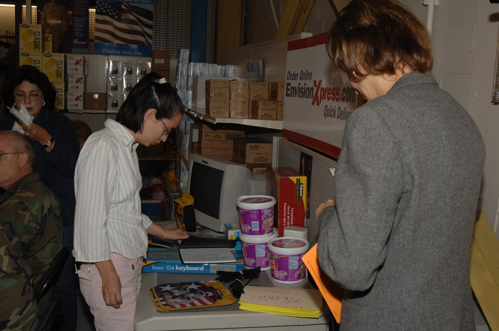 WHITEMAN AIR FORCE BASE, Mo. -- Paige Fleming from the Johnson County Sheltered Workshop picks out a prize after winning "NDEAM" Bingo during a celebration of National Disability Employment Awareness Month Oct. 12. (U.S. Air Force photo/Senior Airman Lauren Padden)  