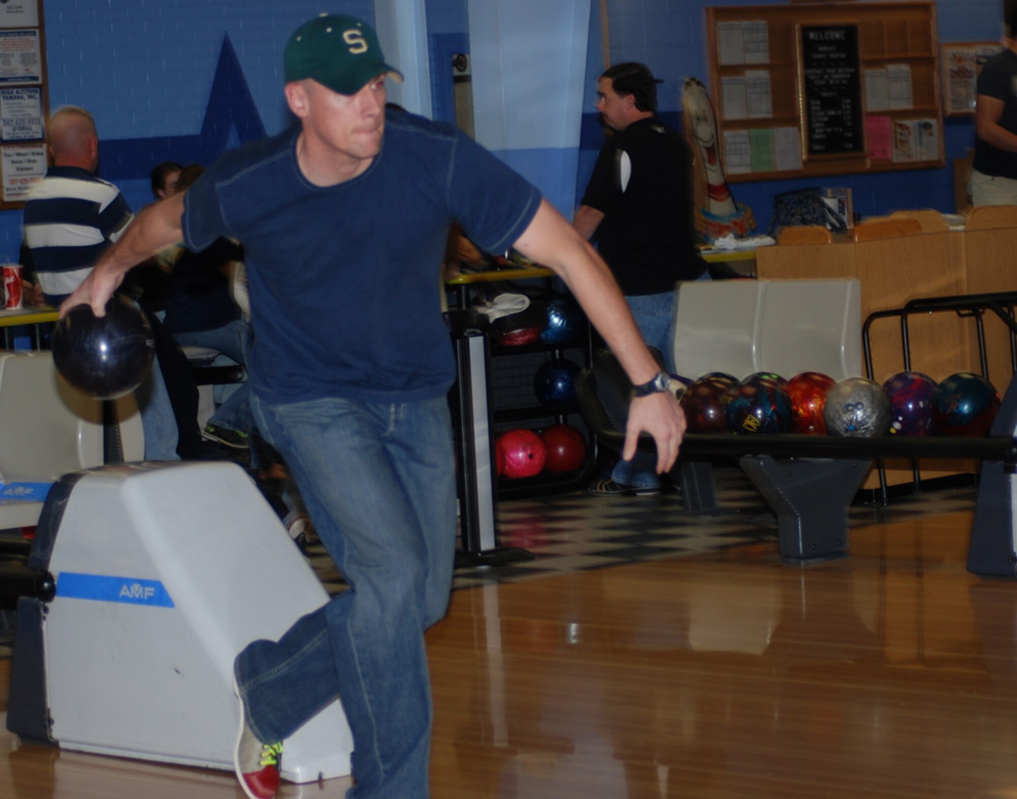 Staff Sgt. Chad Thompson, 90th Space Wing, participates in the opening night of Wednesday night intramural bowling Sept. 26 at the bowling center. League bowling lasts through mid April (Photo by Airman Alex Martinez).
