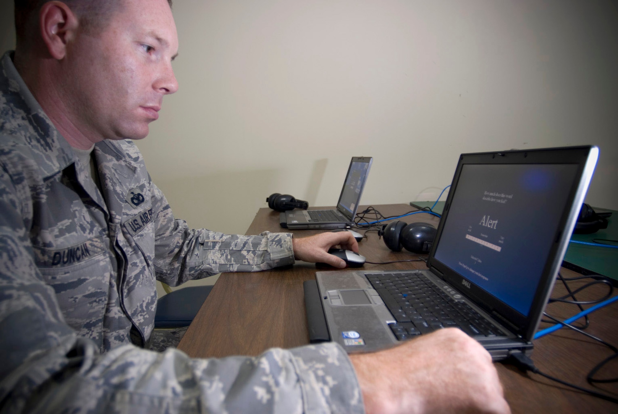 Staff Sgt. Justin Duncan takes the Automated Neuro-Psychological Assessment Metric 4 to establish a baseline for cognitive functioning should he sustain injuries affecting mental performance. The 386th Expeditionary Medical Group is administering the assessment to members of Det. 3, 732nd Expeditionary Security Forces Squadron, who are augmenting the Army in "in-lieu-of" taskings.  (U.S. Air Force photo/Master Sgt. John Nimmo, Sr.) 