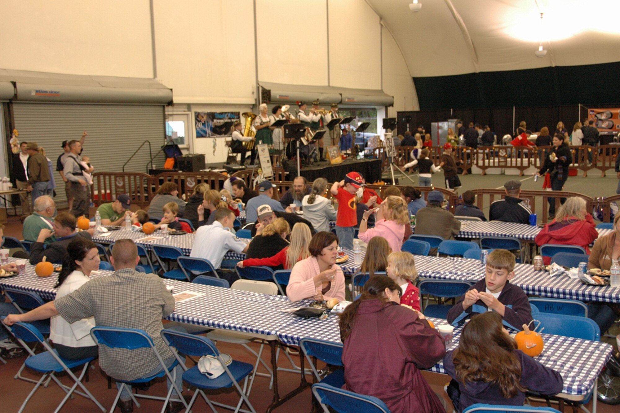 HANSCOM AFB, Mass. – Members of the base community attend the 66th Services Squadron’s Oktoberfest held in the Tennis Bubble on Oct. 12. The event featured German music and food, entertainment and fun activities for children. (U.S. Air Force photo by Dennis Lewis)