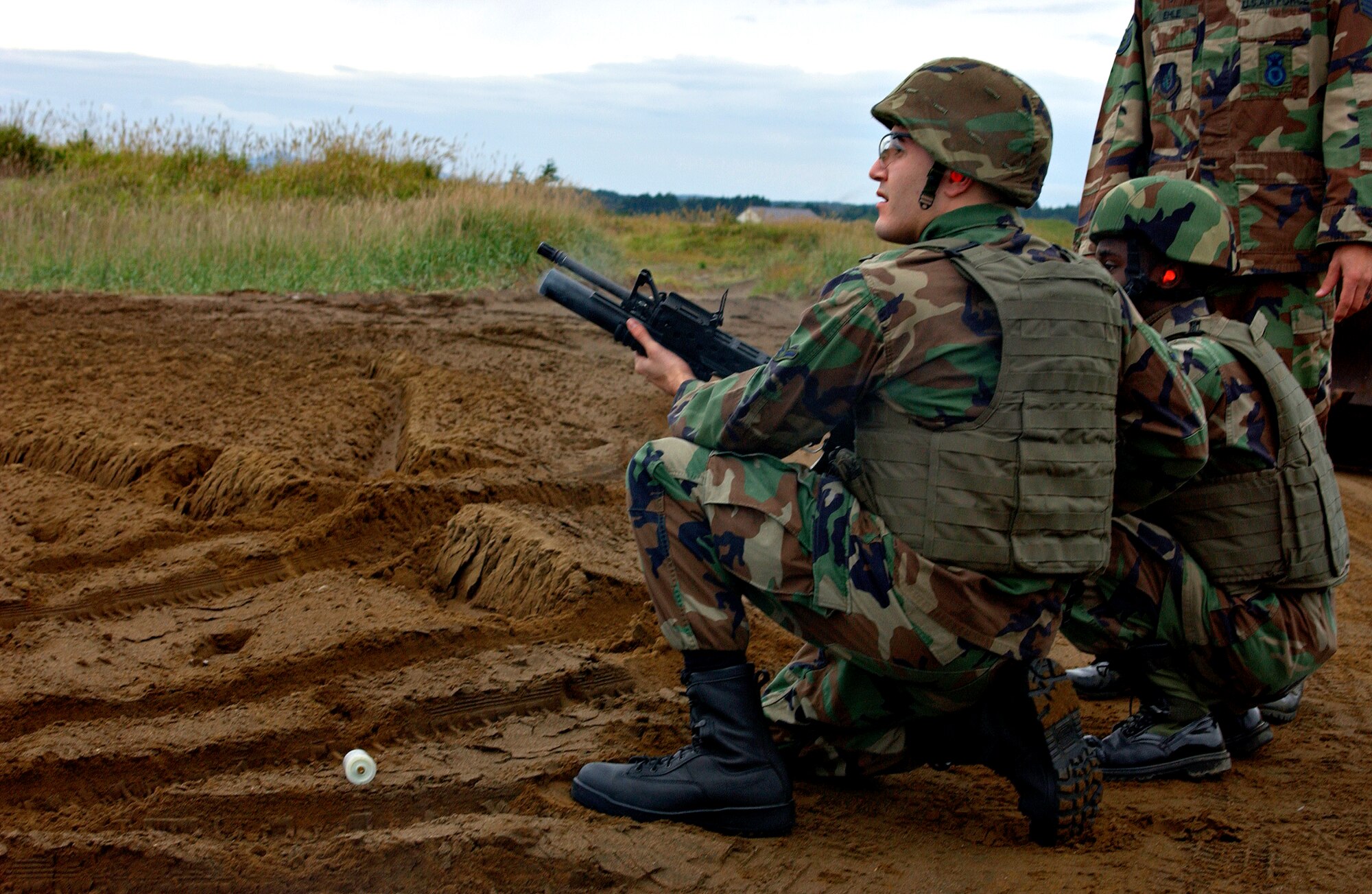 MISAWA AIR BASE, Japan -- Airman Austin Perez, 35th Security Forces Squadron, prepares to fire another grenade with the M-203 Grenade Launcher at Draughon Range on Oct. 11, 2007. The Security Forces Squadron conducts training as needed for members of Security Forces that are new to the base or are preparing for deployment. (US Air Force photo by Airman 1st Class Eric Harris)(RELEASED)