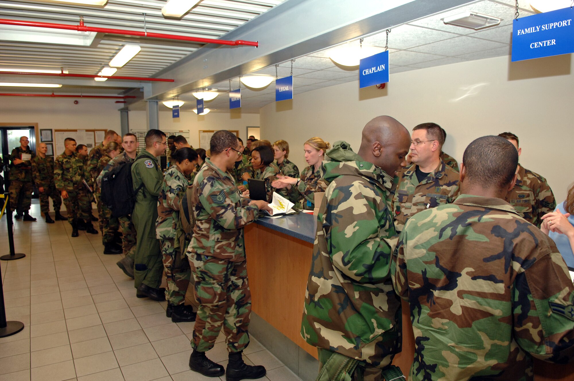 Multiple agencies provided deployment briefings and information to participants of the Operational Readiness Exercise in the Joint Mobility Processing Center on Ramstein Air Base, Germany, Oct. 12. The exercise is designed to test the ability of Airmen to survive in austere environments with chemical, biological, radiological, nuclear and explosive hazards. (U.S. Air Force photo/Airman 1st Class Marc I. Lane)(RELEASED)