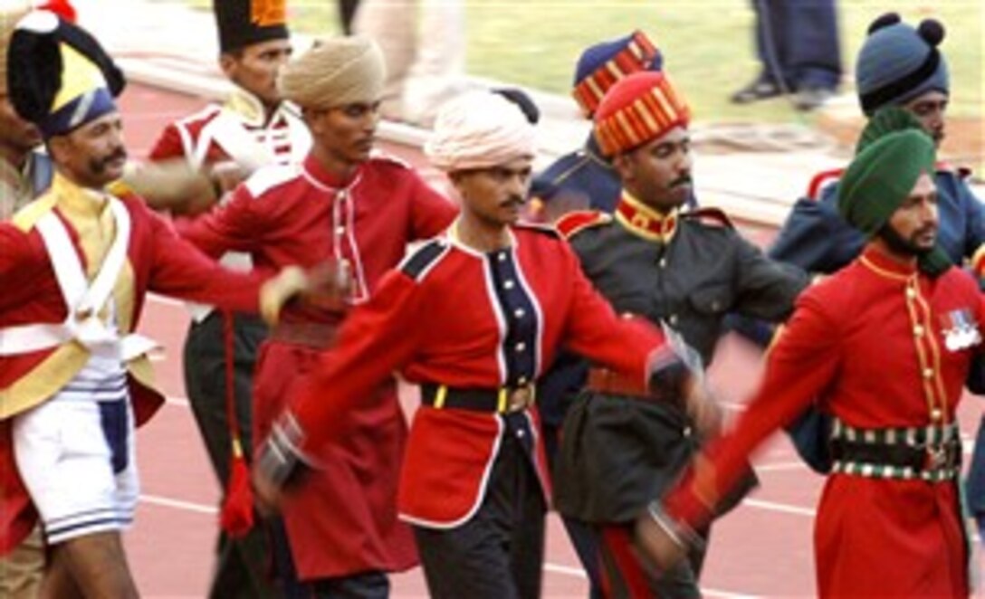 Indian soldiers in historical, traditional and contemporary ceremonial dresses lead the athletes of the World Games of the 4th CISM Military World Games in Hyderabad, India, Oct. 14, 2007. The Conseil Internationale du Sport Militaire's World Games is the largest international military Olympic-style event in the world. 