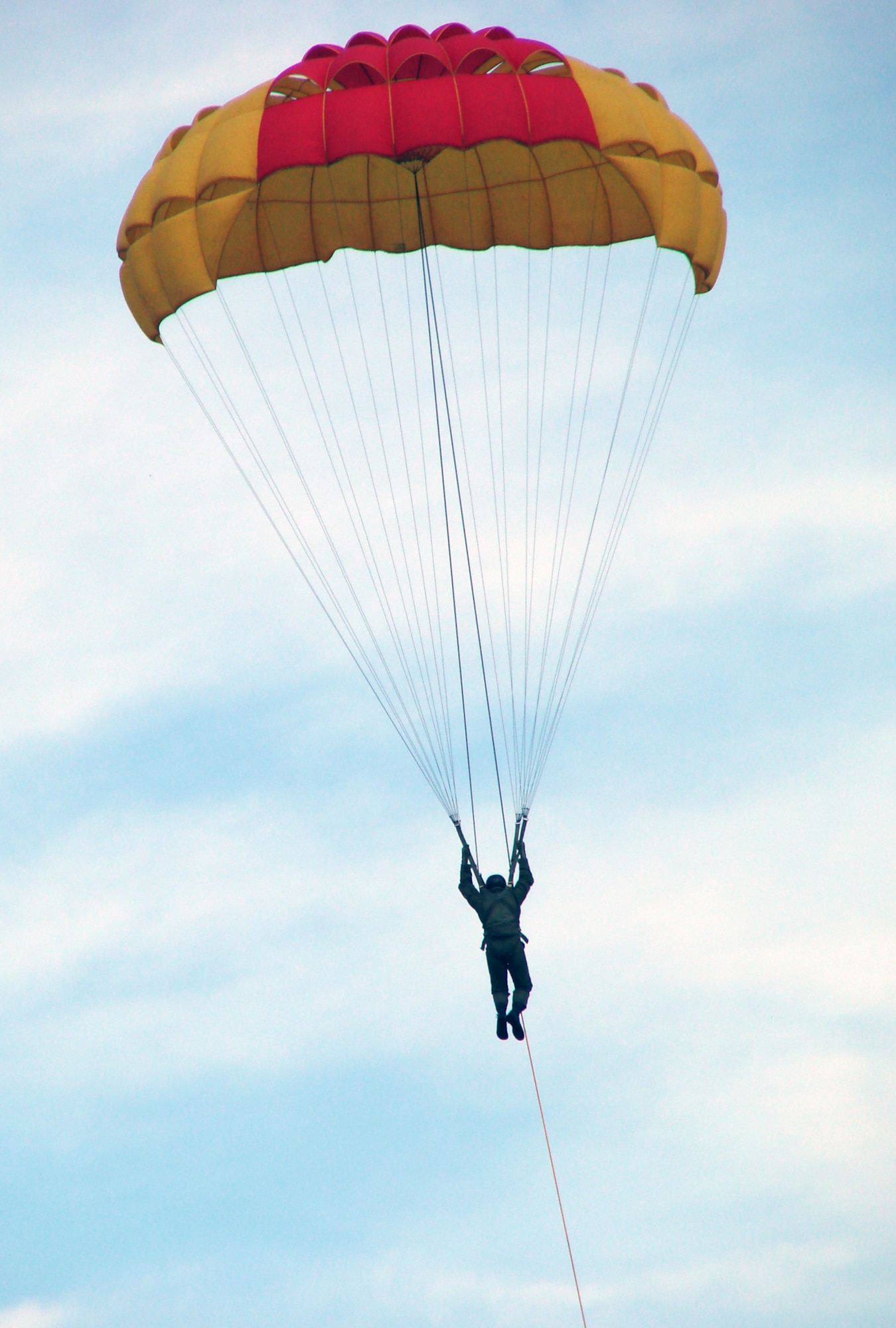 Second Lieutenant Philip DeLong, a student of Class 08-15, demonstrates landing techniques during parasailing training Oct. 15. Lieutenant DeLong was the last student pilot to parasail at Vance Air Force Base. (U.S. Air Force photo by Tech. Sgt. Mary Davis)