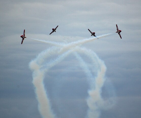 The Canadian Forces Snowbirds aerial demonstration team at the 15 Wing celebrated their end-of-season show with special guests, family and friends Oct. 12 in Moose Jaw, Saskatchewan. The Snowbirds wanted to thank Malmstrom for their efforts in May after one of their pilots died during a practice flight on base, and invited 11 Airmen to their last show of the year. (U.S. Air Force photo/Senior Airman Eydie Sakura).
