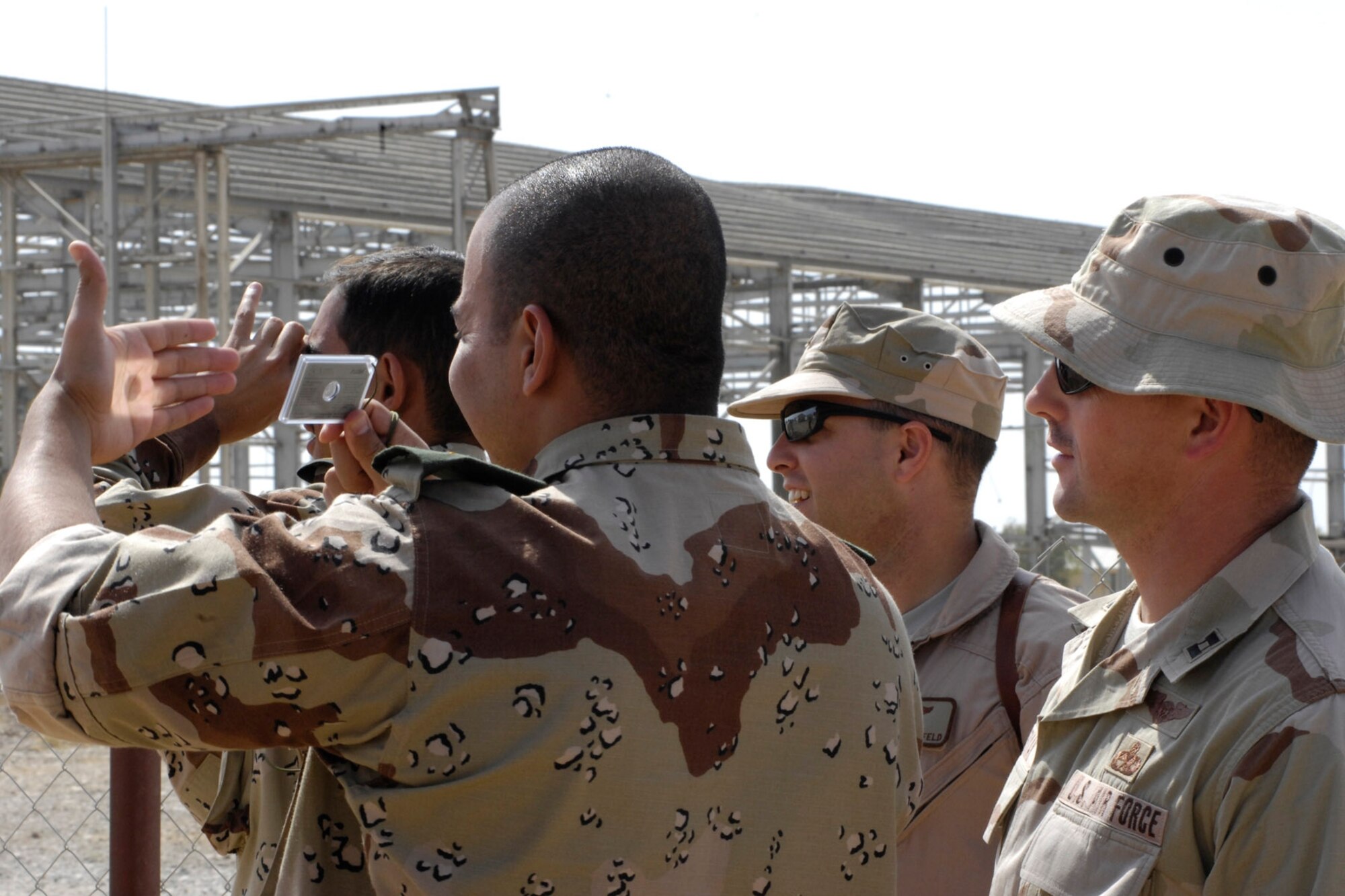 The new Iraqi Air Force pilots-in-training learn basic fundamentals in navigation, rescue, and egress training. The students are taught by USAF Capt. Wes Alderman, deployed from Moody AFB, Georgia, and Maj. Joey Markusfeld, deployed from Vance AFB, Okla., to the 52nd Expeditionary Flying Training Squadron, Kirkuk Regional Air Base, Iraq.  U.S. Air Force members deployed to the 52nd Expeditionary Flying Training Squadron, Kirkuk Regional Air Base, Iraq, opened the school on Oct. 1 and began training the first new pilots of the Iraqi air force.  (U.S. Air Force official photo by Staff Sgt Angelique Perez/released)
