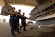 LANGLEY AIR FORCE BASE, Va. -- Tech. Sgts. Thomas Harper, David Martens and Steve Breeden load an AIM-9 missile on station 3 of an F-22A during the weapons load competition at the 94th Fighter Squadron Oct. 17.  This particular crew is from the Air National Guard's 192nd Fighter Wing, working out of the 94th Aircraft Maintenance Unit. The 27th and 71st AMUs  will perform similar competitions and earn points based on the fastest and safest crew. After each crew loads their weapons, scores are tallied and a winning crew will be announced. These competitions are performed on a quarterly basis and these winners will compete for the Load Crew of the Year. (U.S. Air Force photo/Senior Airman Cecil C. McCloud)