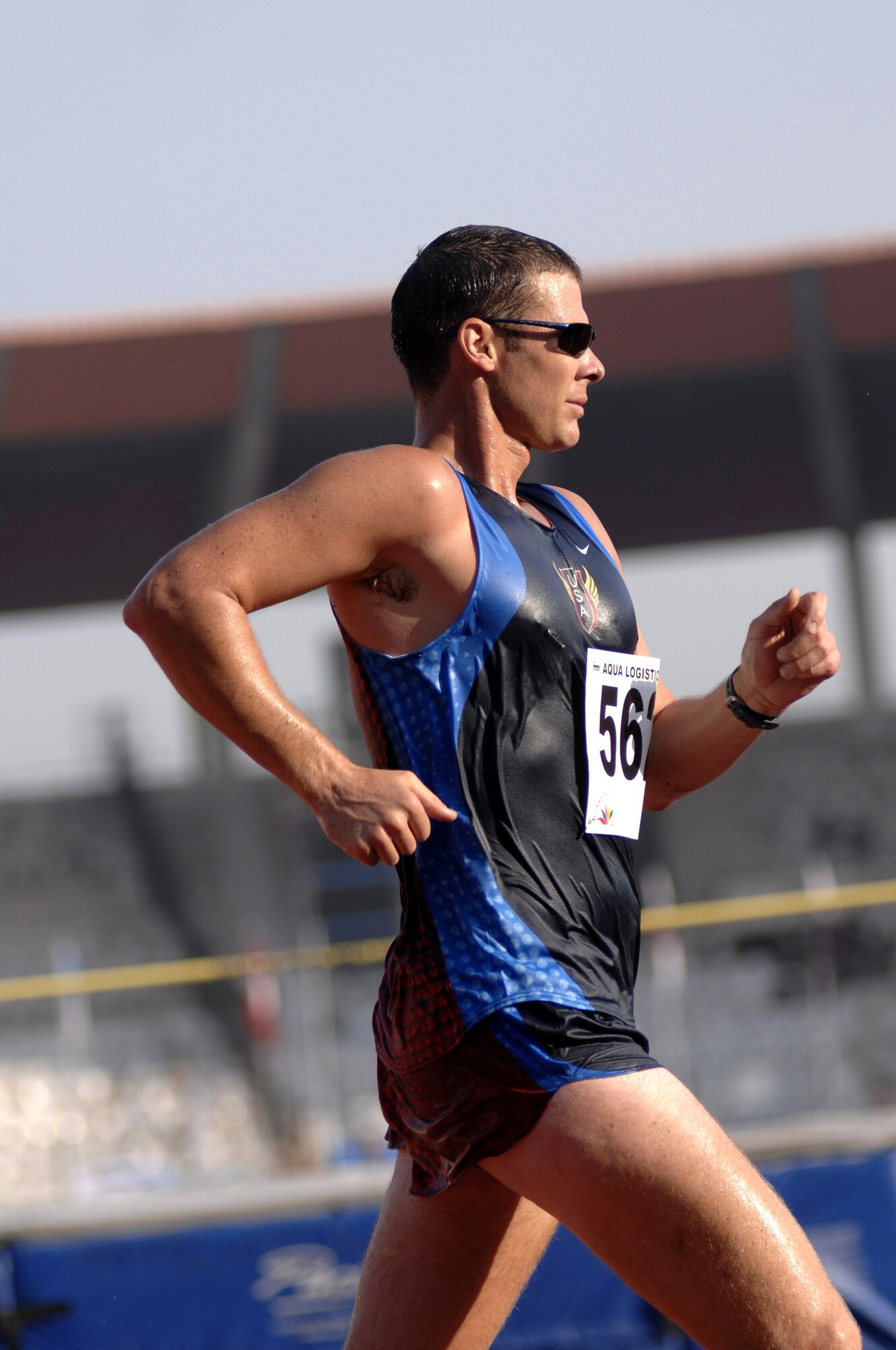 Army Sgt. John Nunn speed walks during the Military World Games competition Oct. 15 in Hyderabad, India. He placed ninth in the event. The Conseil Internationale du Sport Militaire's Military World Games event is the largest international military Olympic-style event in the world. In this year's fourth edition of the Games, 103 countries and more than 5,000 athletes are scheduled to compete Oct. 14 through 21 in boxing, diving, soccer, handball, judo, military pentathlon, parachuting, sailing, shooting, swimming, volleyball and track and field. The purpose of the Military World Games is to promote friendship through sport. (U.S. Air Force photo/Tech. Sgt. Cecilio Ricardo Jr.)
