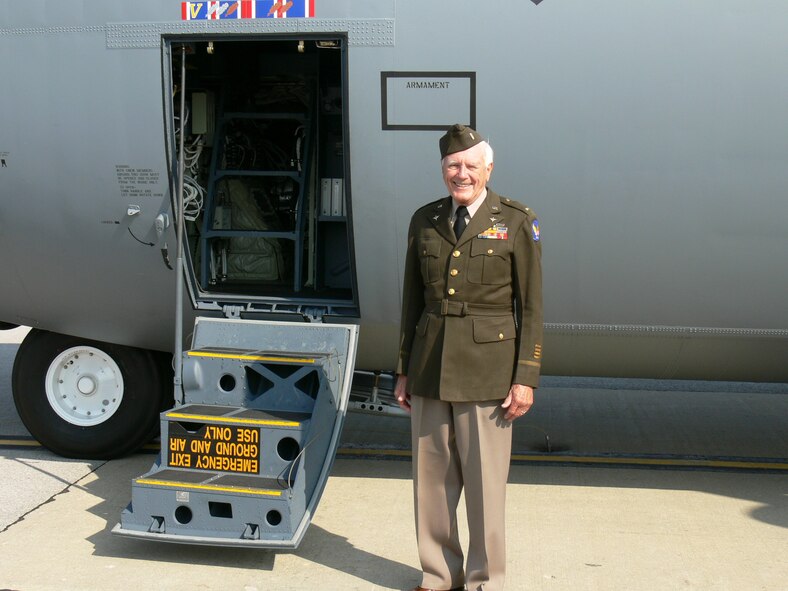 Lt. Richard "Corky" Korthals, a World War II pilot, poses in his service dress "pinks" at a 317th Troop Carrier Group reunion. Col. Kevin Jackson, 317th Airlift Group commander, awarded Lieutenant Korthals and his fellow Jungle Skippers the Asiatic-Pacific Campaign and Bronze Star Medals in St. Louis, Mo., Oct. 5 to for actions he performed in 1944. (Courtesy photo)
