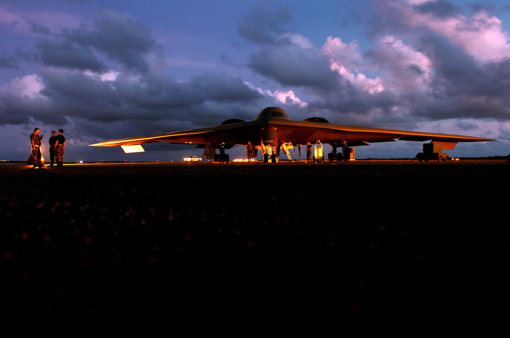 A B-2 Spirit bomber is prepared for a morning mission at Anderson Air Force Base, Guam. The aircraft is from the 509th Bomb Wing at Whiteman Air Force Base, Mo.  (U.S. Air Force photo/Master Sgt. Val Gempis)