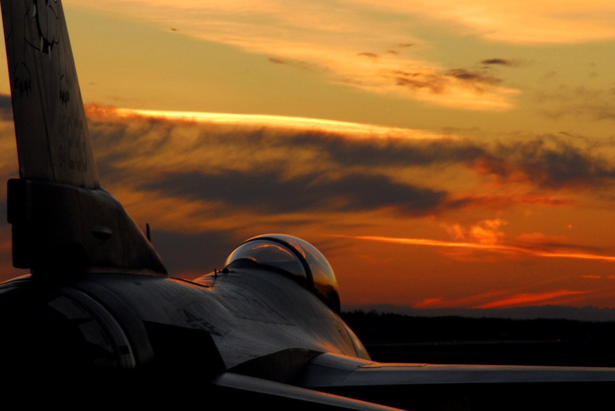A 148th Fighter Wing F-16 Fighting Falcon from the Minnesota Air National Guard rests for the day awaiting the next day's inspection Oct. 13in Duluth, Minn. The unit is undergoing an Operational Readiness Inspection designed to evaluate the wing's ability to prepare and deploy servicemembers, equipment and support assets to a combat environment. (U.S. Air Force photo/Senior Airman Donald Acton)
