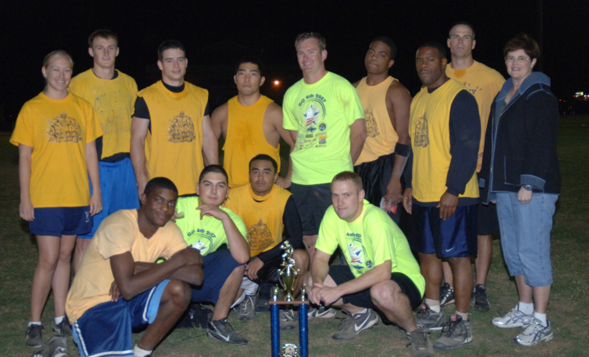 The 14th Medical Group Intramural flag football team poses with their second place trophy after the championship game Oct. 11. The 14th MDG was defeated by the 14th Operations Support Squadron #1 team. They are pictured here with Col. Susan Hall, 14th Medical Group commander. (U.S. Air Force photo by Airman 1st Class Danielle Powell)
