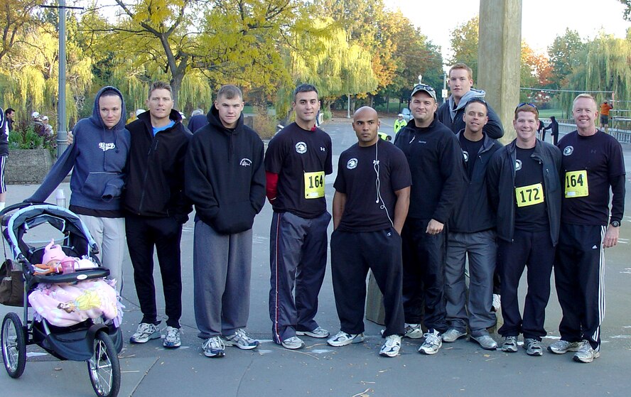 FAIRCHILD AIR FORCE BASE, Wash. -- Members of the 336th Training Group who competed in the Spokane Marathon Oct. 14 wait near the start line of the race. A team of Survival, Evasion, Resistance and Escape specialists received first place in the marathon with a time of 3 hours, 6 minutes, 10 seconds. (Courtesy photo)
