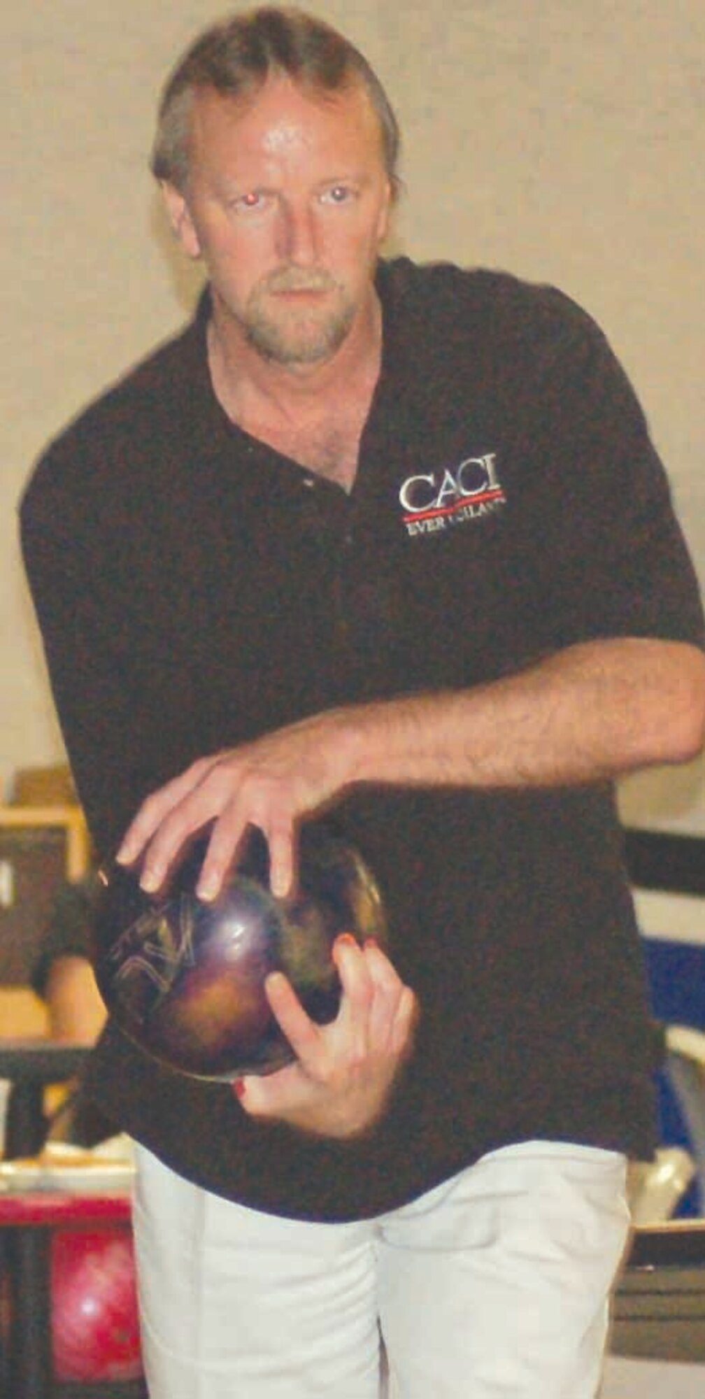 Hellifino bowler Karl Dooley preapres to throw a ball during a match against the Fire Dawgs on Oct. 10 at the Tinker Bowling Center. Hellifino won the match 3433-3125. (Air Force photo by John E. Banks)