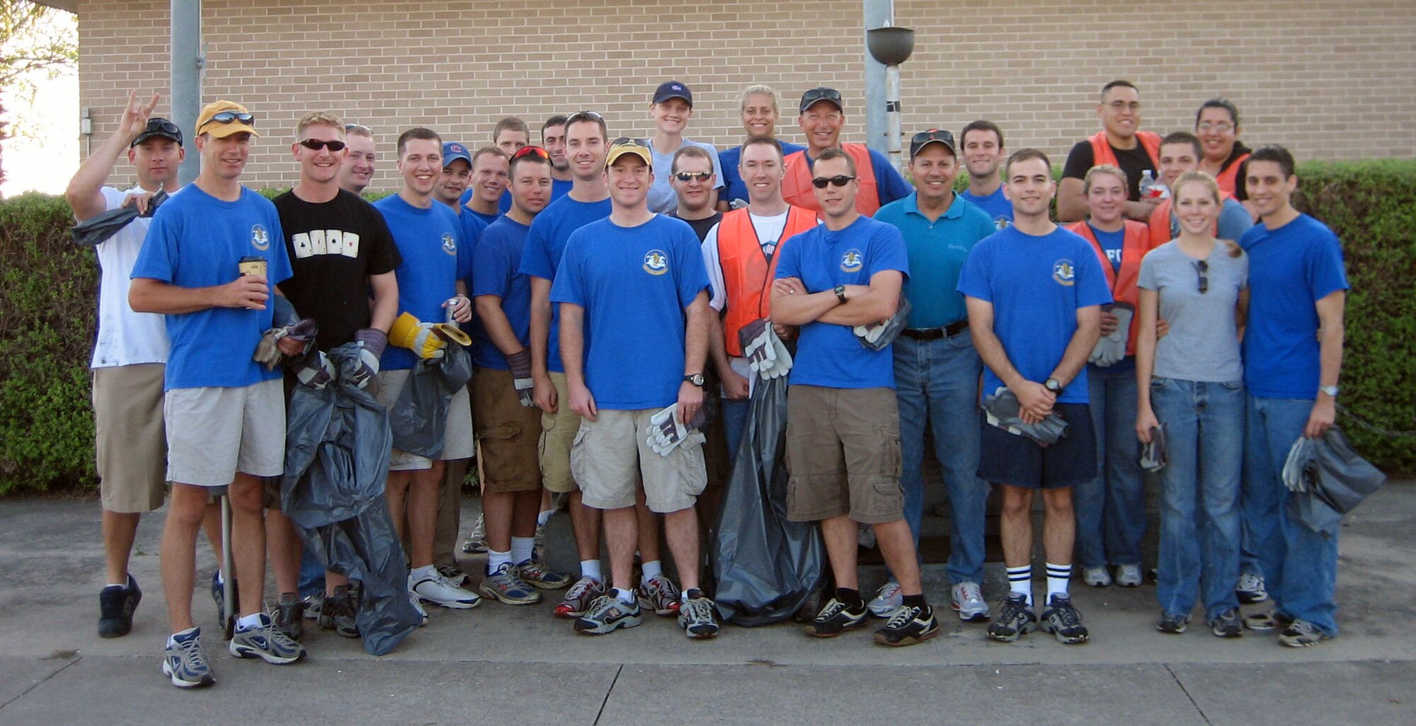 LAUGHLIN AIR FORCE BASE, Texas -- Members of the 85th Flying Training Squadron, many others and Efrain Valdez, Del Rio, Texas Mayor, take a group picture together after the 2nd citywide clean-up Oct. 6. Participants in the clean-up started at 8 a.m. and volunteered hours of their Saturday collecting more than 2.1 tons of trash along the Bedell Ave. in downtown Del Rio. (Contributed photo)