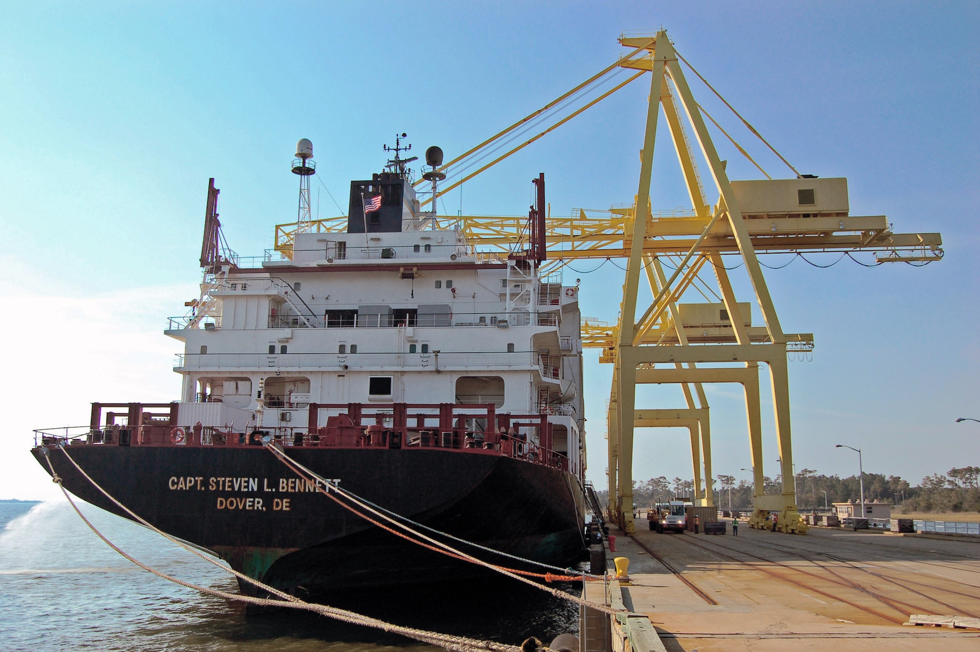 The MV Capt. Steven L. Bennett, one of the Air Force's Afloat Pre-positioned Fleet ships, sits at one of the docks Oct. 16 at the Military Ocean Terminal-Sunny Point, N.C. The APF ships are loaded with thousands of tons of munitions and then sail to a predetermined point in the Pacific or Indian Ocean where they wait to offload their cargo when needed. The Bennett is one of four ships belonging to the APF. (U.S. Air Force photo/Staff Sgt. Matthew Bates) 
