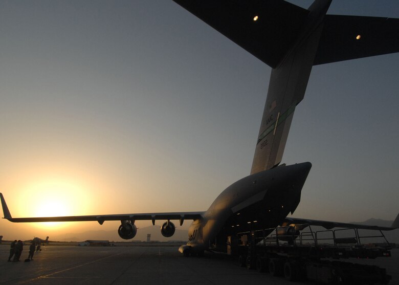 BAGRAM AIRFIELD, Afghanistan - A C-17 Globemaster is loaded in the early morning of Oct. 11, 2007, in preparation of one of the largest airdrops since Operation Enduring Freedom began.  The C-17 played a key role in the delivery of winter supplies to a Forward Operating Base that road conditions prevented a convoy from reaching safely. 
(U.S. Air Force photo/ Staff Sgt. Joshua T Jasper)   (Released)