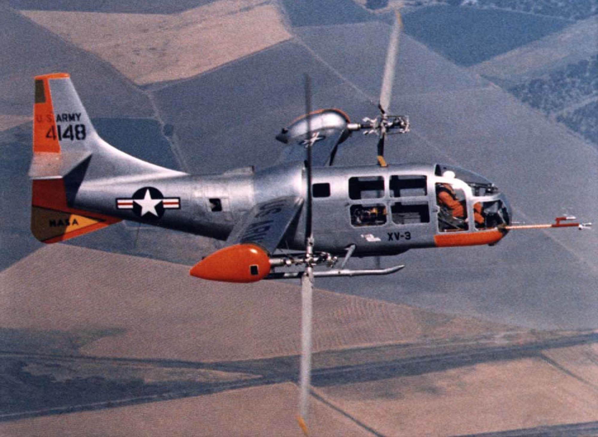Bell Helicopter XV-3 with the proprotors rotated forward for level flight. (Photo courtesy of Bell Helicopter Textron)