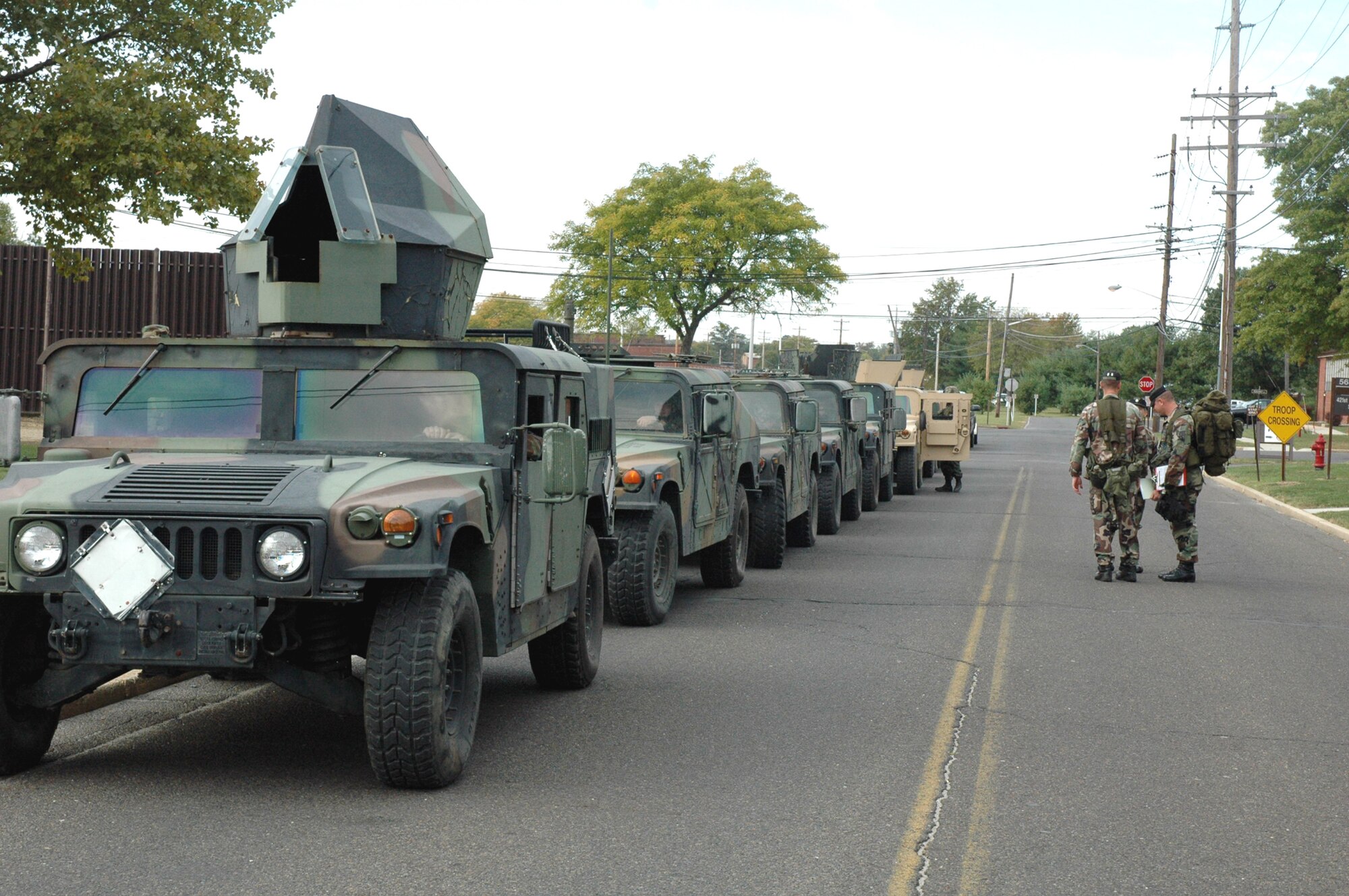 Students and instructors in the Air Force Phoenix Warrior Training Course 08-1 prepare for a convoy out to training for the course Oct. 16 at Fort Dix, N.J.  Phoenix Warrior is a course designed to prepare Air Force security forces Airmen prior to deployment.  The course is taught by the U.S. Air Force Expeditionary Center's 421st Combat Training Squadron. (U.S. Air Force Photo/Tech. Sgt. Scott T. Sturkol)