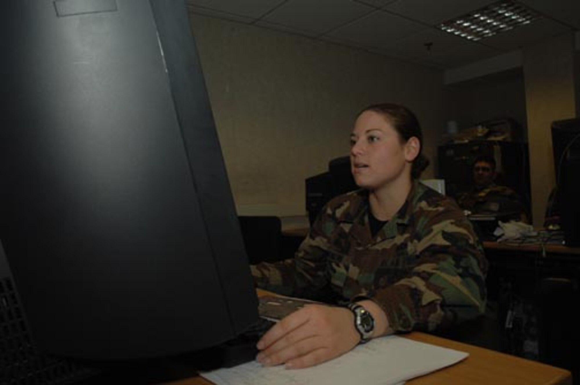 Airman 1st Class Elisabeth Remondini, 48th Operations Support Squadron intelligence analyst, analyzes satellite imagery and controls message traffic during a local NATO Tactical Evaluation Exercise on Oct. 17. (U.S. Air Force photo by Airman 1st Class John Easterling)