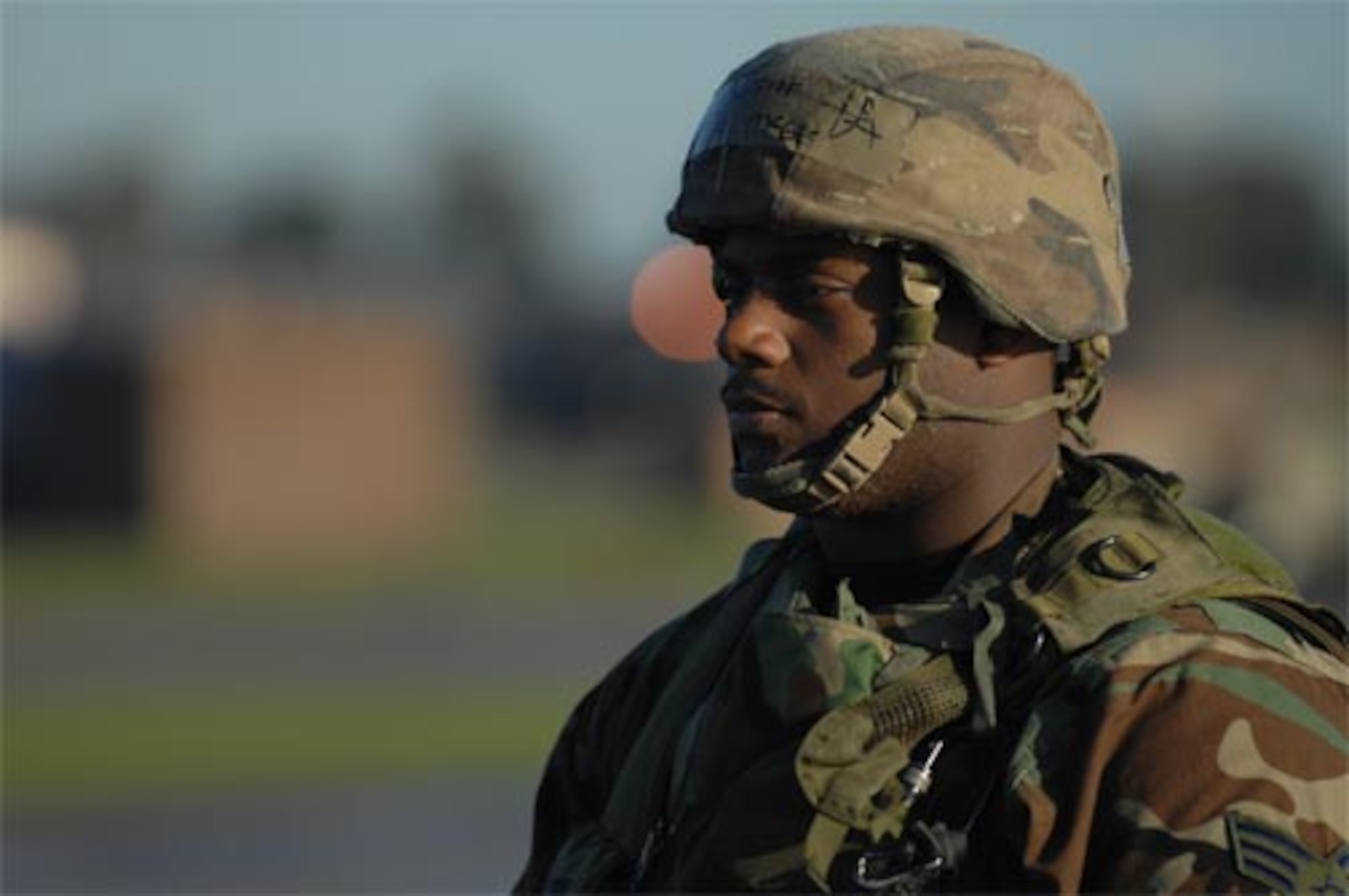 Senior Airman Evis, 48th Security Forces Squadron, patrols the flightline, providing security inside of the play area during  a local NATO Tactical Evaluation Exercise on RAF Lakenheath Oct. 17. (U.S. Air Force photo by Airman 1st Class John Easterling)
