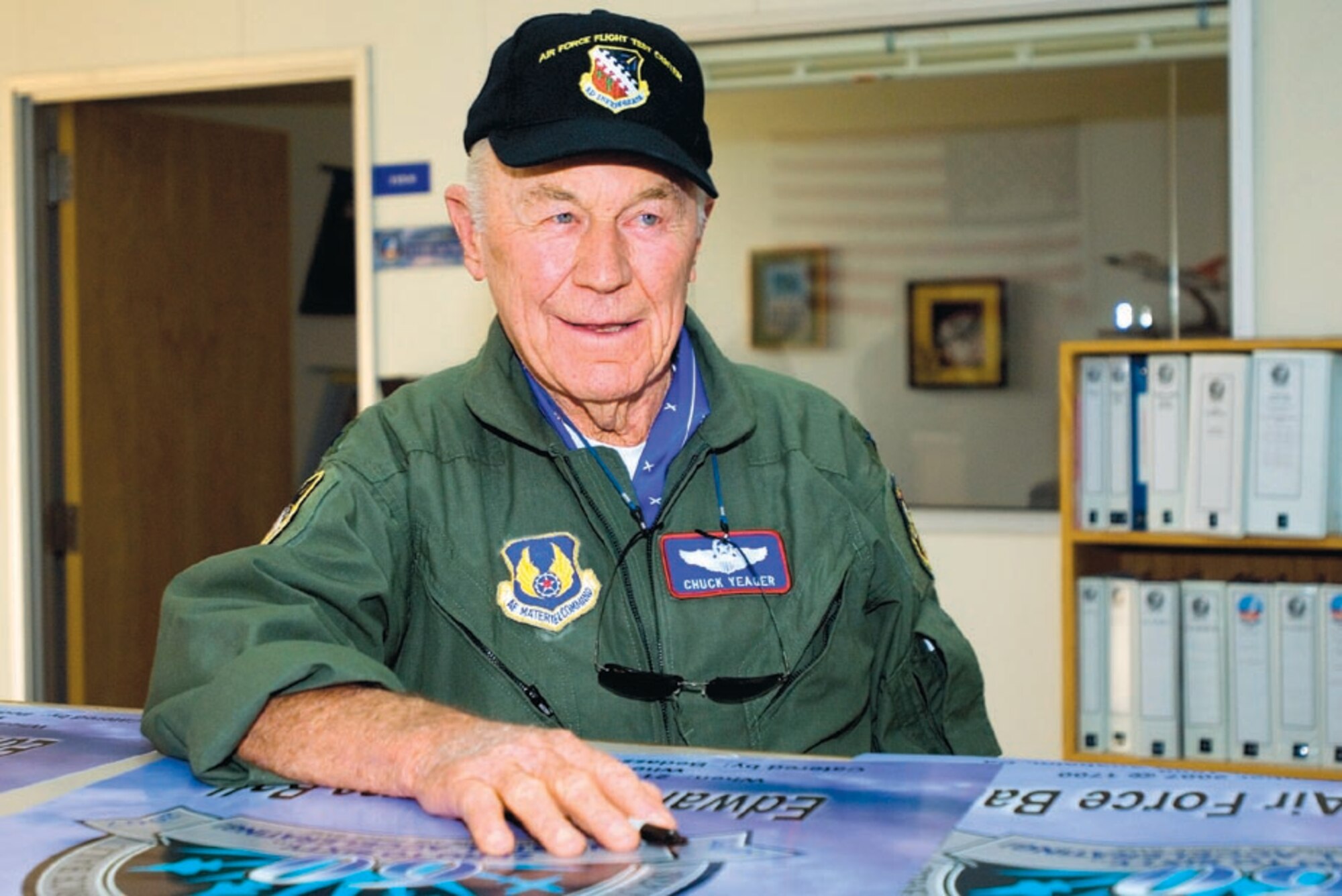 Gen. (ret.) Chuck Yeager smiles as his photo is taken. (Courtesy  Photo)