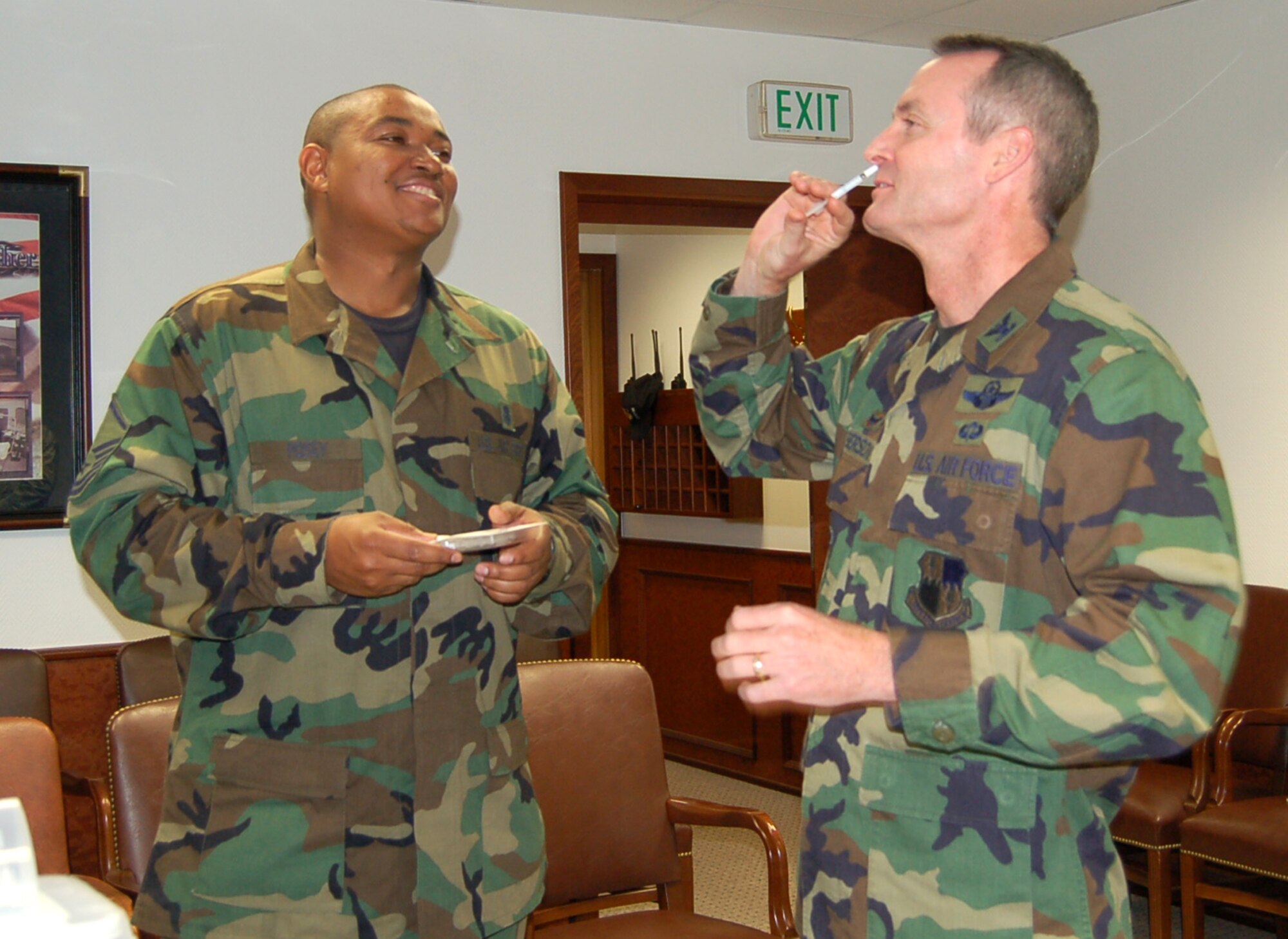 SPANGDAHLEM AIR BASE, Germany –Col. Darryl Roberson, 52nd Fighter Wing commander, administers his flu mist vaccination as Master Sgt. Fentress Posey, 52nd Medical Group, observes Oct. 17. Active-duty personnel can receive a flu mist vaccination Oct. 24 and 25 from 7 a.m. to 5 p.m. at the base theater. (U.S. Air Force photo/Staff Sgt. Tammie Moore)