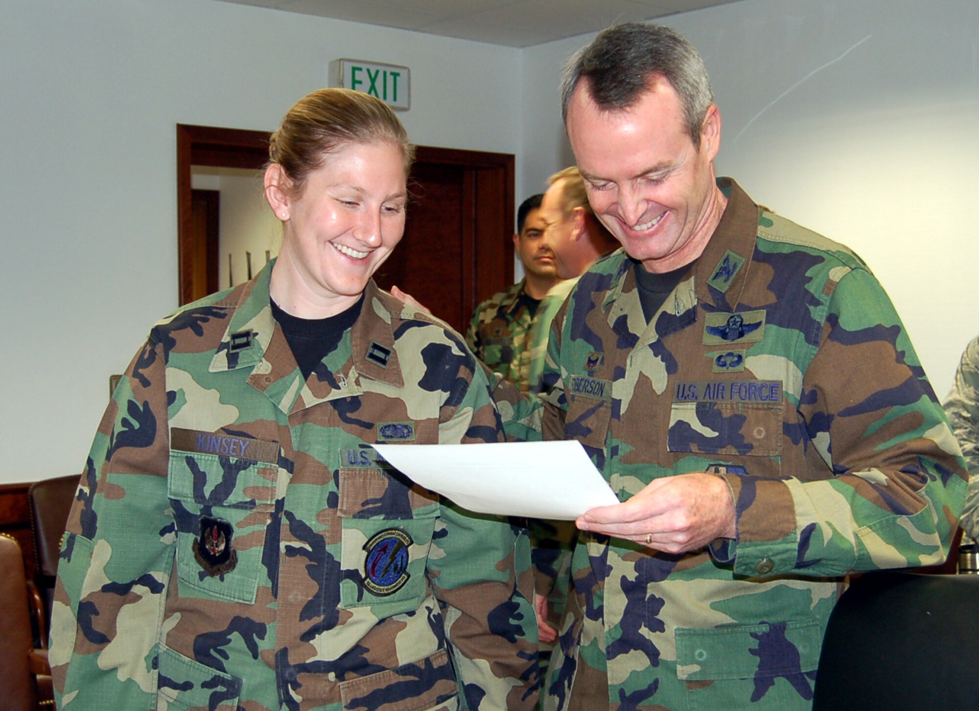 SPANGDAHLEM AIR BASE, Germany -- Col. Darryl Roberson, 52nd Fighter Wing commander, and Capt. Holly Kinsley, 52nd Logistics Readiness Squadron, review a flu mist questionnaire Oct. 17. Captain Kinsley an installation deployment officer is a native of Baker City, Ore. She spent the day shadowing the commander to learn about base operations. (U.S. Air Force photo/Staff Sgt. Tammie Moore) 

