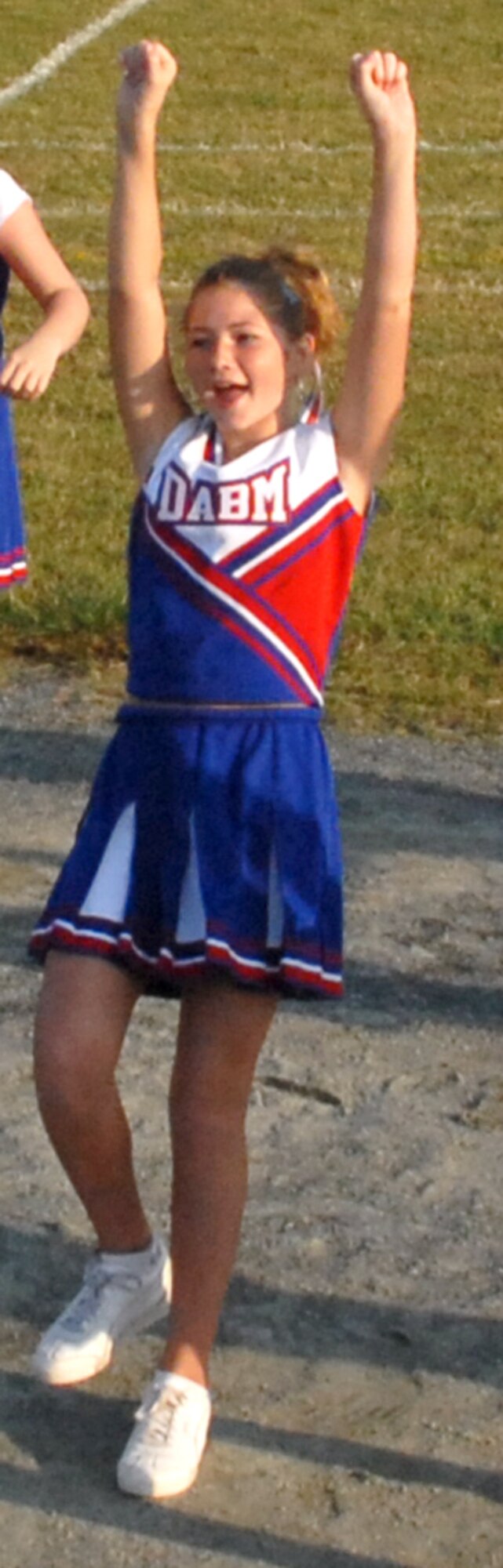 A Dover Air Base Middle School cheerleader peforms cheers to drum up parent and fan support in the Oct. 10 soccer game against the Cavs. (U.S. Air Force photo/Tech. Sgt. Kevin Wallace)