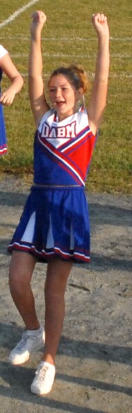 A Dover Air Base Middle School cheerleader peforms cheers to drum up parent and fan support in the Oct. 10 soccer game against the Cavs. (U.S. Air Force photo/Tech. Sgt. Kevin Wallace)