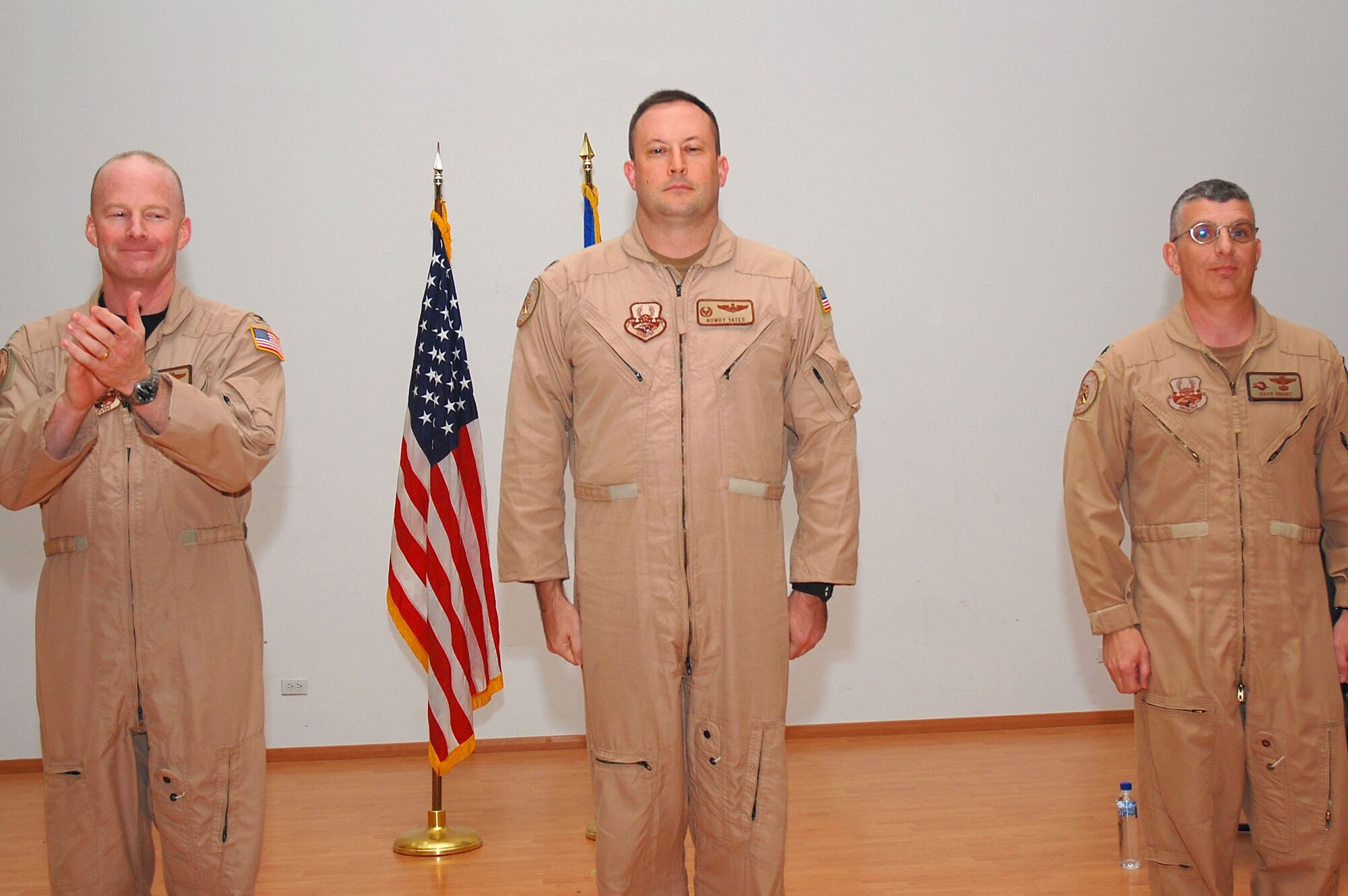 SOUTHWEST ASIA -- 737th Expeditionary Airlift Squadron change of command.  Lt. Col. Brian Yates assumes command of the squadron from Lt. Col. David Knight at an undisclosed location Oct. 17.  (U.S. Air Force photo by Staff Sgt. Tia Schroeder)