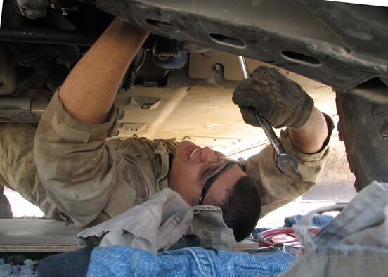 KANDAHAR AIRFIELD, Afghanistan - Senior Airman Daniel Garcia of Tucson, Ariz., replaces a gear box on an up-armored humvee here Oct. 12.
Airman Garcia is deployed from the 35th Logistics Readiness Squadron at Misawa Air Base, Japan,  to the 455th Air Expeditionary Wing, whose mission is to provide close air support, mobility, intelligence, surveillance and reconnaissance in support of the Global War On Terror.
