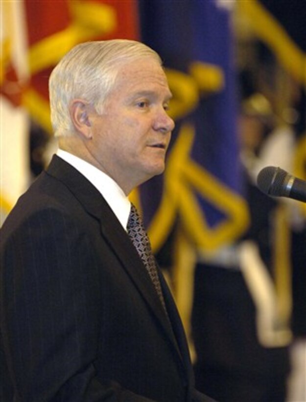 Secretary of Defense Robert M. Gates praises U.S. Air Force Gen. Kevin Chilton as the general assumes command of U.S. Strategic Command during a ceremony at Offutt Air Force Base, Neb., on Oct. 17, 2007.  