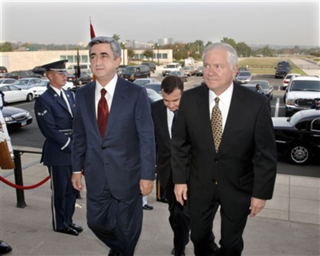 Armenian Prime Minister Serzh Sargsyan (left) arrives at the Pentagon for bilateral security talks with Secretary of Defense Robert M. Gates (right) on Oct. 18, 2007.  