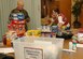 Master Sgt. Michael O’Donnell, 1st Fighter Wing Chapel superintendent, and Joanna McCormack, Catholic coordinator, take inventory of donations at the Bethel Manor Chapel Oct. 17. The items, which were donated by dorm residents, the Catholic and Protestant parishes and local Airmen, will be used will be shipped to deployed Air Force chaplains in Balad and Afghanistan. From there, items such as snacks, DVDs, game systems and clothing will be distributed to deployed servicemembers. (U.S. Air Force photo/Staff Sgt. Katrina Shellman)