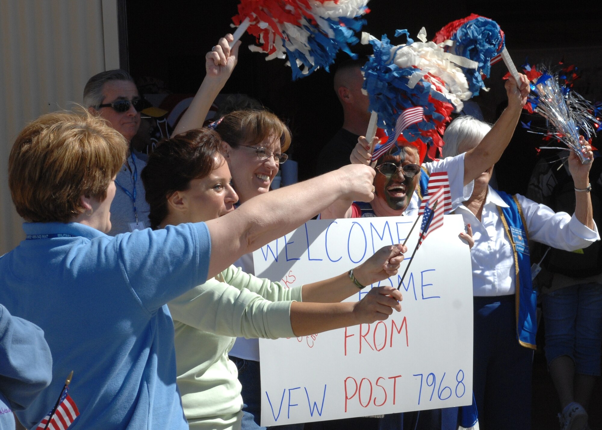 Members of the VFW Post 7968 welcome home little Thunderbolts returning from Operation KIDS Oct. 13.(photo by Tech. Sgt. Raheem Moore)