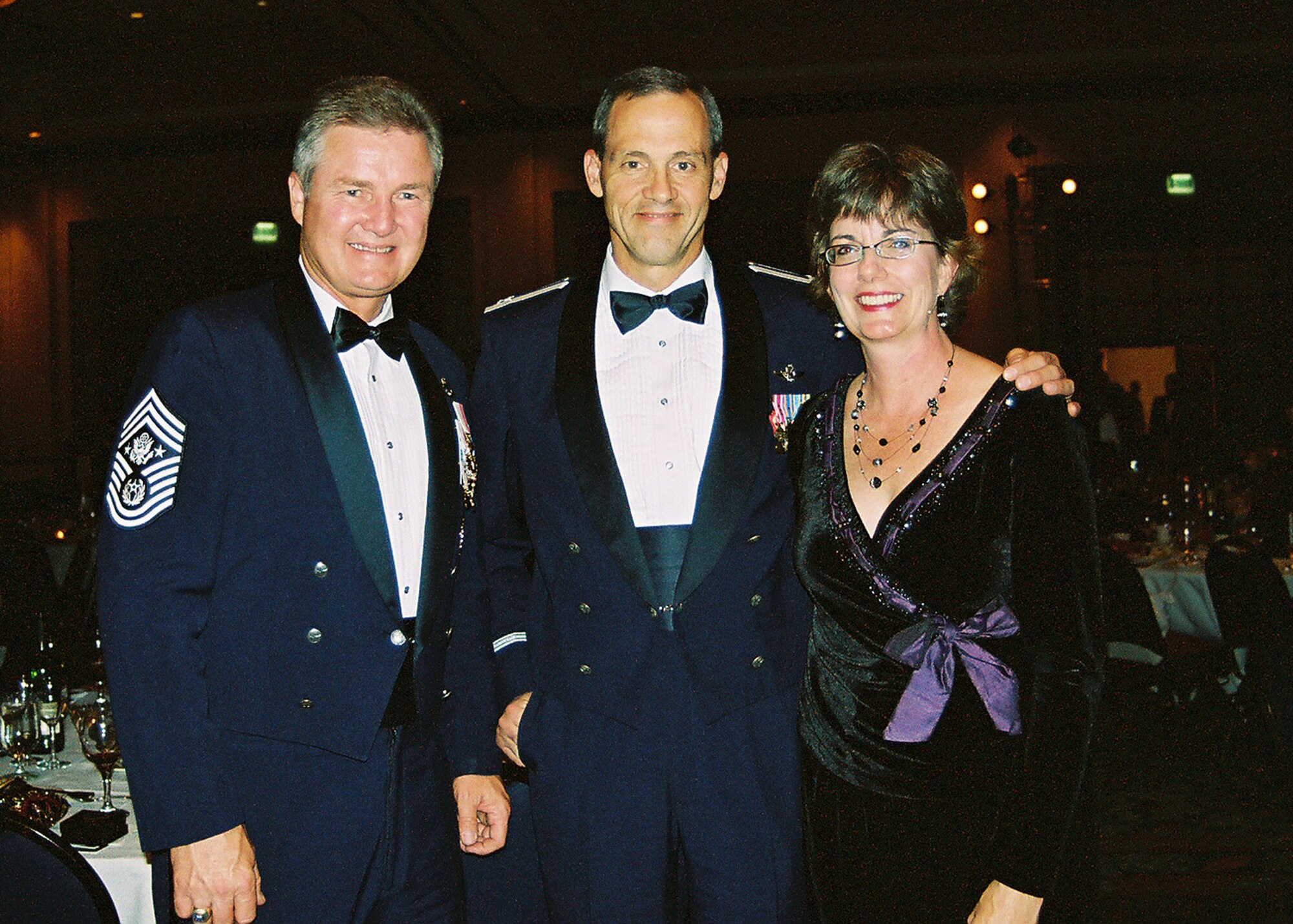 (left to right) Retired Chief Master Sergeant of the Air Force Gerald R. Murray, Col. Joseph Thomas, 94th AW vice commander and his wife Peggy, take time for a chat and a smile during the 2007 Air Force Ball during Air Force Week Atlanta Oct. 13.  The ball climaxed Air Force Week Atlanta events held Oct. 8-14.