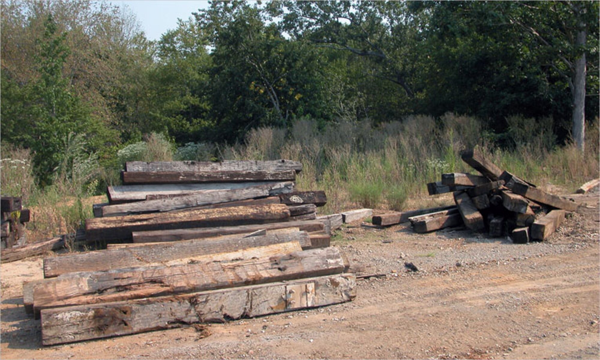 Wooden rail road ties are used as cribbing in support of projects at Arnold Air Force Base, Tenn. Masonry rubble is also used as filler and base material for landfill road construction. (Photo by Mike Hodges)