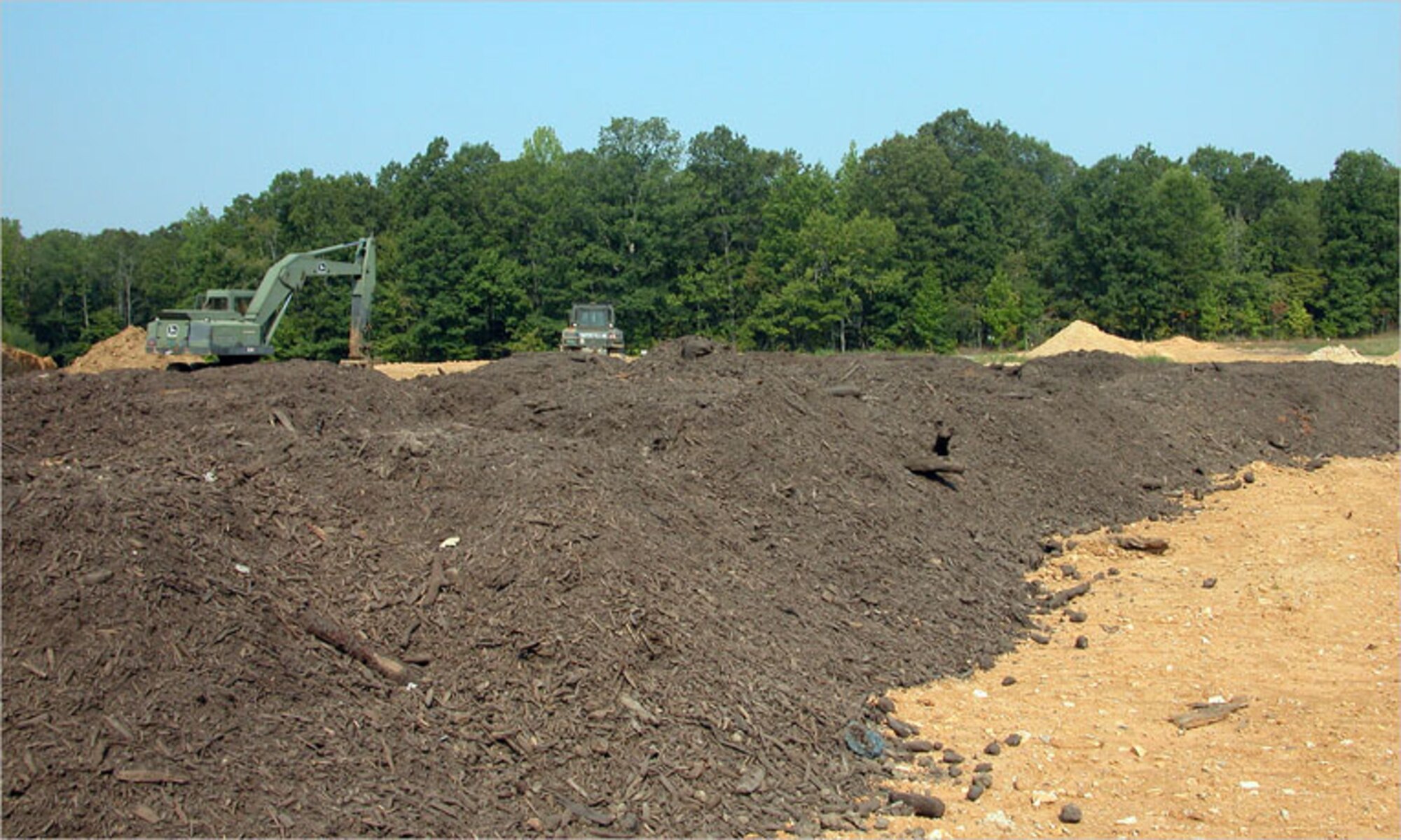 Mulch from the Horse Barn Road wood pile is now stockpiled at the landfill to prevent stormwater runoff. (Photo by Mike Hodges)