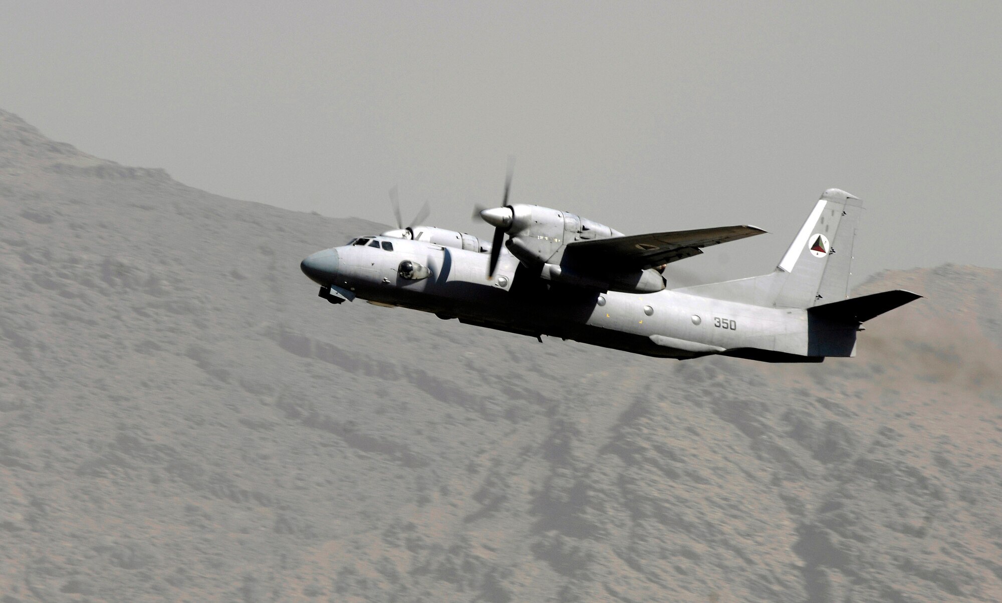 An Afghan national army air corps AN-32 cargo plane takes off Oct. 18 at Kabul International Airport, Afghanistan. The plane's mission is to fly winter supplies to ANA troops in Kandahar. The ANA air corps has been able to fly more cargo to support their own troops due to the recent introduction and training of aircraft loadmasters. 
(U.S. Air Force photo/Staff Sgt. Brian Ferguson)