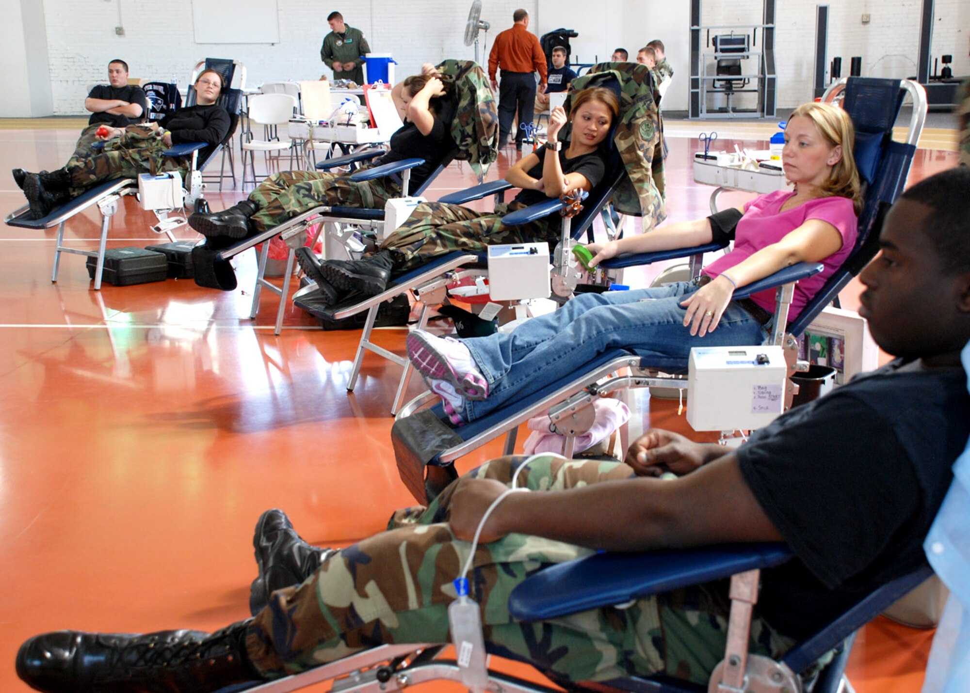 Warren members wait patiently while donating blood at the Oct. 11 blood drive in Independence Hall, the 24-hour gym. The next base blood drive is Nov. 19 (Photo by Airman Alex Martinez).
