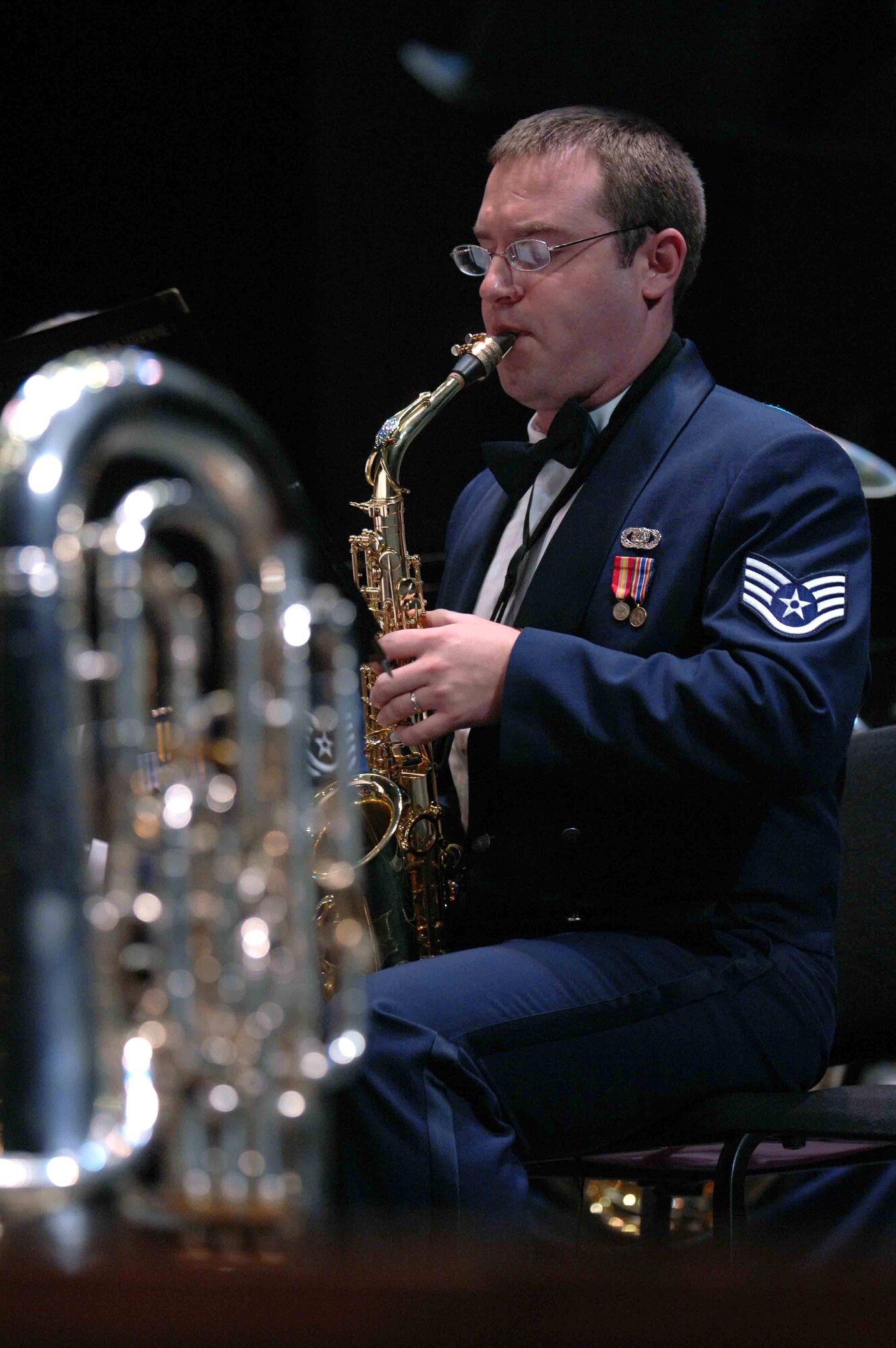 Staff Sgt. Nathan Drabek plays the saxophone during an Oct. 17 performance at the University of Nevada Las Vegas. Sergeant Drabek is a member of the Air Force Band of the Golden West. The Band of the Golden West, from Travis Air Force Base, Calif., is the only active duty Air Force band west of the Rocky Mountains. They are scheduled to perform five free concerts in the Las Vegas community. The band supports 10 active duty Air Force bases, five Air Force Reserve wings and five recruiting squadrons in California, Washington, Oregon, Idaho and Nevada with more than 500 annual performances. (U.S. Air Force photo/Senior Airman Larry E. Reid Jr.) 
