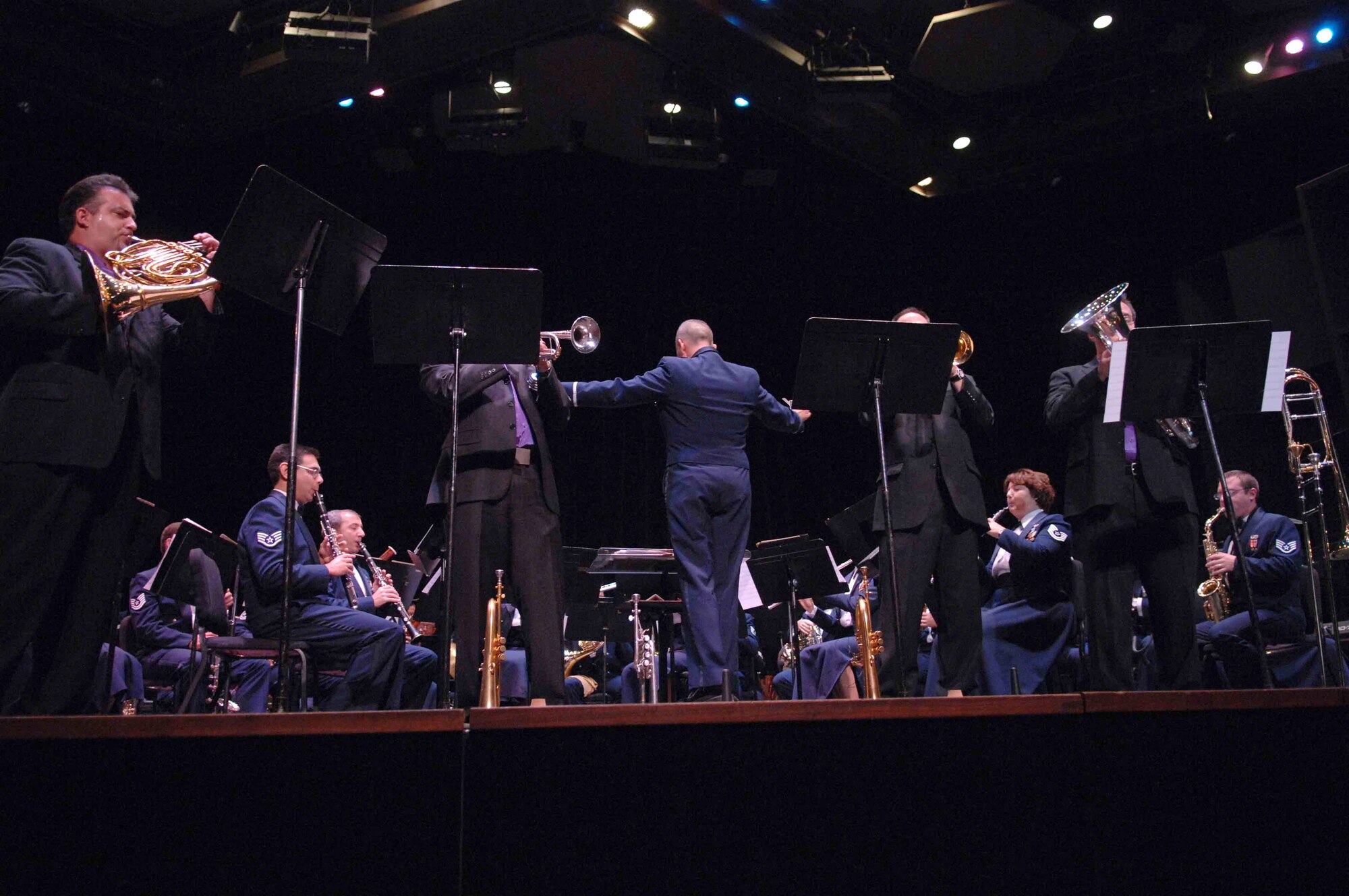 Members of the Boston Brass perform alongside the Air Force Band of the Golden West during an Oct. 17 performance at the University of Nevada Las Vegas. The Band of the Golden West, from Travis Air Force Base, Calif., is the only active duty Air Force band west of the Rocky Mountains. They are scheduled to perform five free concerts in the Las Vegas community. The band supports 10 active duty Air Force bases, five Air Force Reserve wings and five recruiting squadrons in California, Washington, Oregon, Idaho and Nevada with more than 500 annual performances. (U.S. Air Force photo/Senior Airman Larry E. Reid Jr.) 
