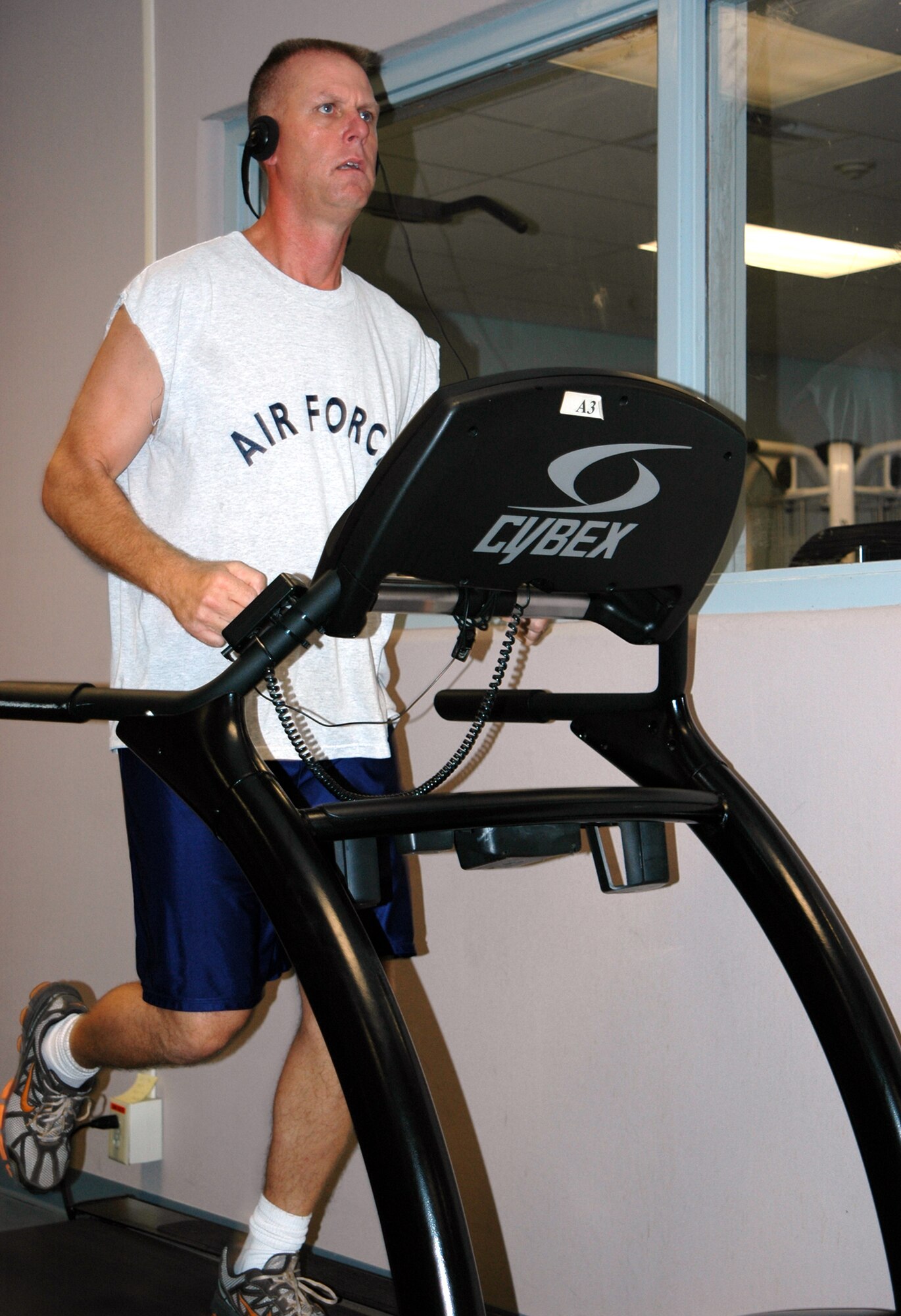 GRISSOM AIR RESERVE BASE, Ind., -- Lt. Col. Larry Shaw, 434th Operations Support Squadron's chief of mission development, runs on a treadmill as he works out at the base fitness center. (U.S. Air Force photo/ Senior Airman Carl Berry)