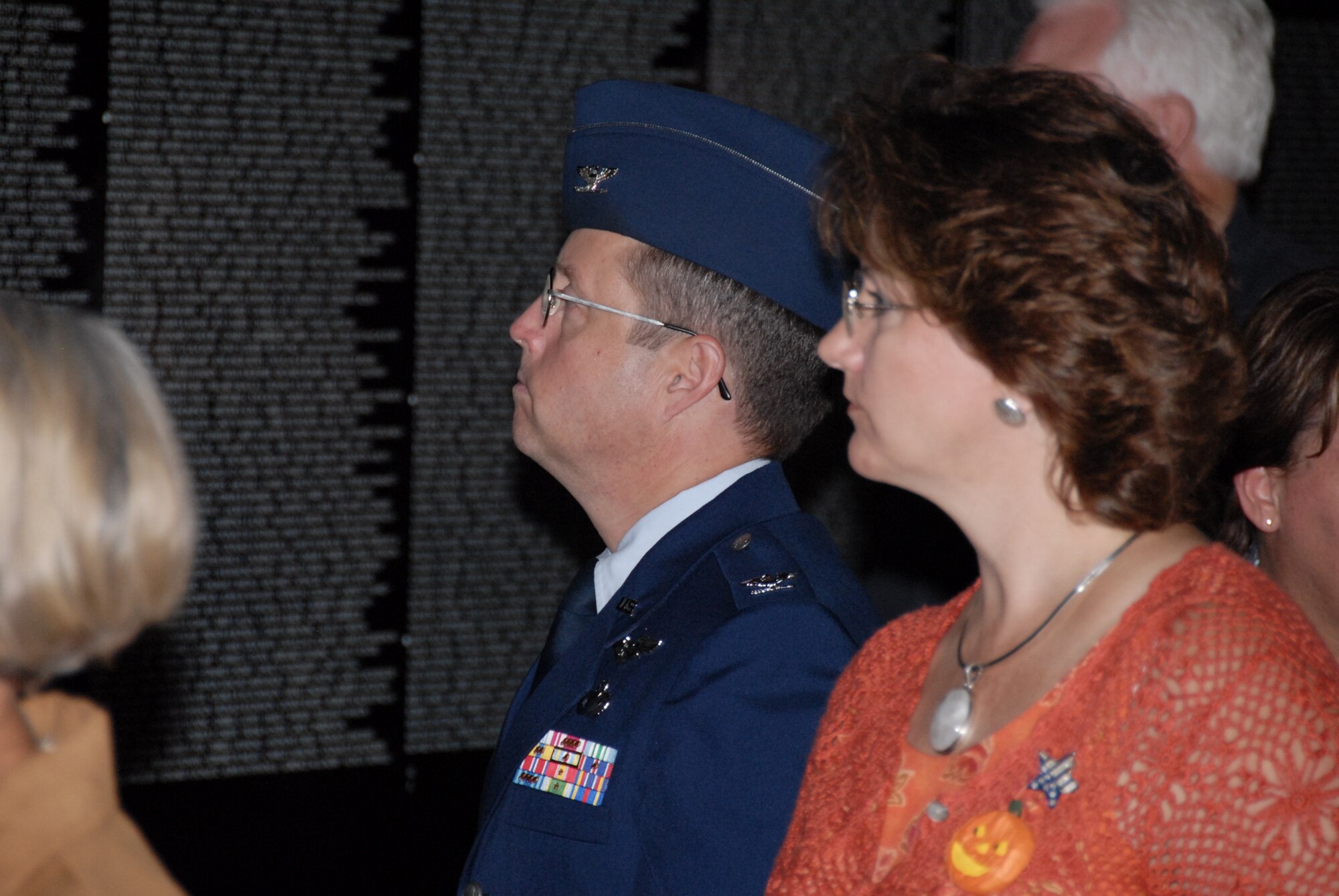 Col. Jim Jolliffe, 704th Test Group commander, and his wife, Liz Jolliffe, look at the "Moving Wall," a traveling replica of the Vietnam Veterans Memorial.  Colonel Jolliffe spoke at the opening ceremony of the "Moving Wall" Oct. 19 in Winchester, Tenn. (Photo by Rick Goodfriend)