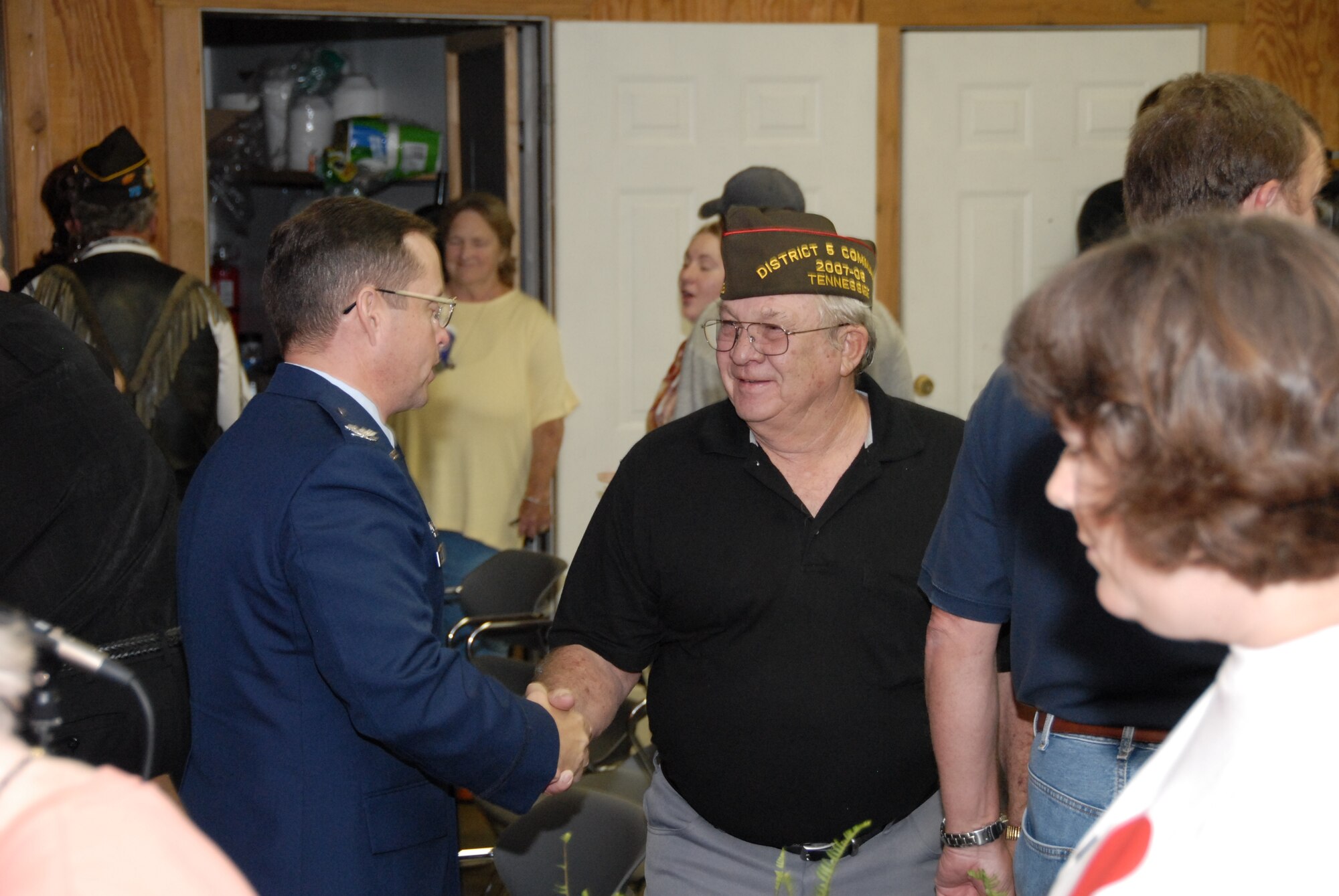 Col. Jim Jolliffe, 704th Test Group commander, talks with a Vietman veteran at the opening ceremony of the "Moving Wall" Oct. 19 in Winchester, Tenn. Colonel Jolliffe was a guest speaker at the event. The "Moving Wall" is a traveling replica of the Vietnam Veterans Memorial. (Photo by Rick Goodfriend)