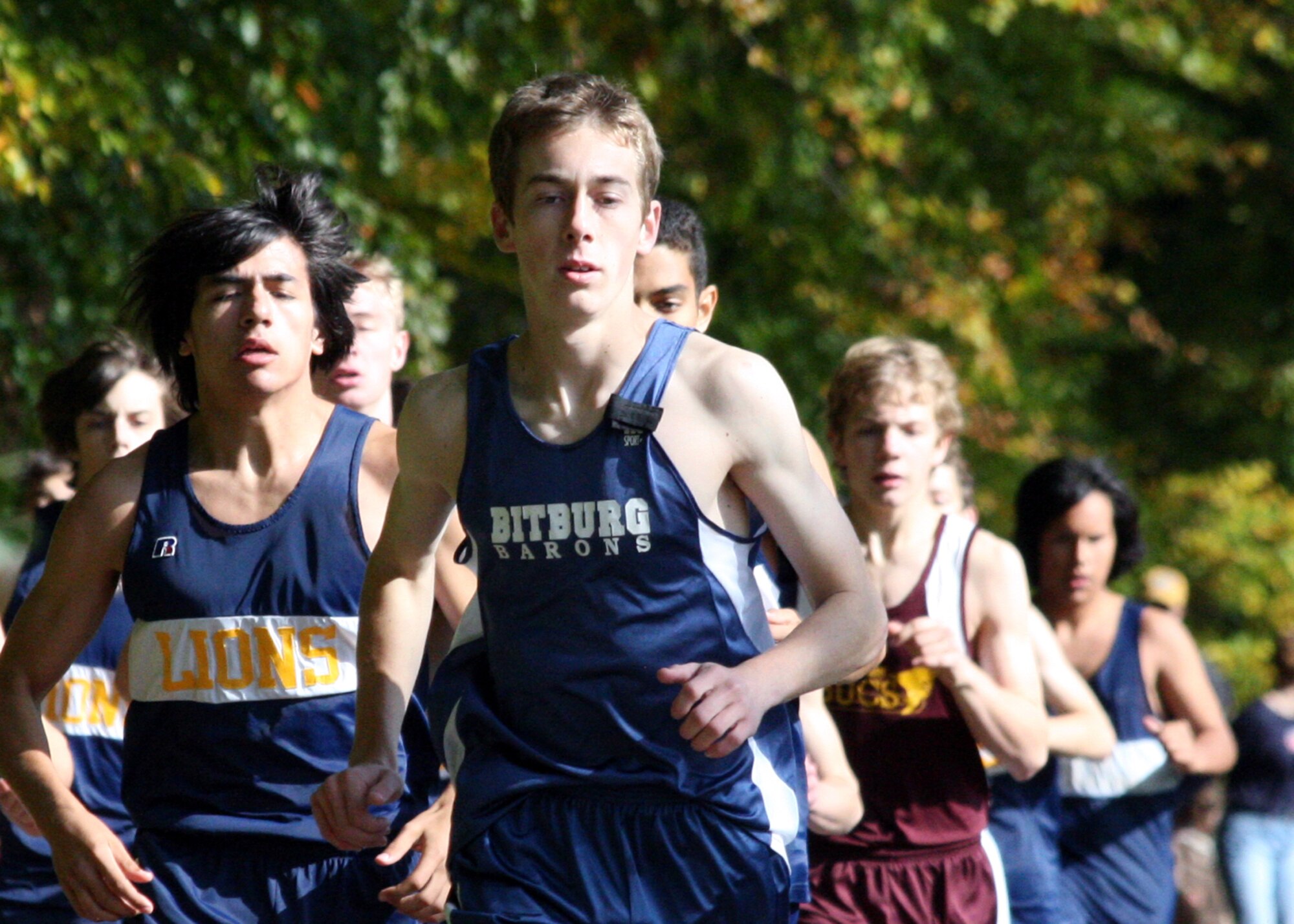 BITBURG-MOETSCH, Germany – After an emotional beginning of the season, Bitburg High School runner Ryan Poock, a senior, secured his position as the fastest male runner in Europe at a home cross country meet Oct. 13. Poock finished in 16 minutes, 20 seconds, a personal record, and 67 seconds faster than the previous course record. (U.S. Air Force photo/Rob Meehan)